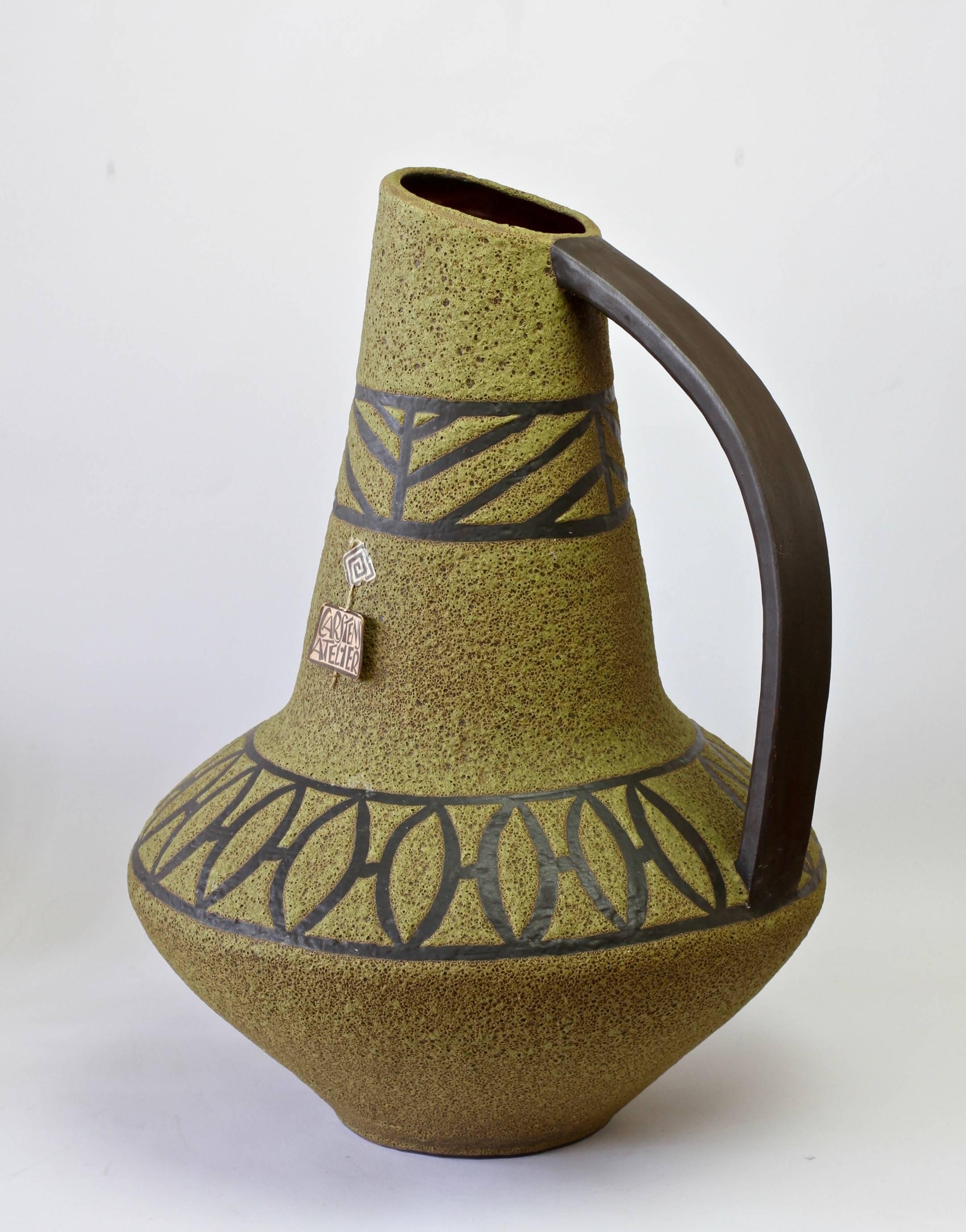 Beautifully hand thrown and glazed floor vase designed by Heinz Siery for Carstens Tonniesh of circa 1965. Carstens are considered to be one of the finest producers of West German Pottery from the Mid-Century era. This vase, part of the 'Atelier'