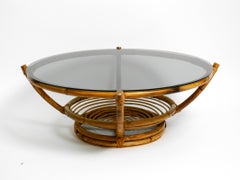 1970s large Italian coffee table made of bamboo and original smoked glass