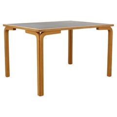 Grande tavolo da pranzo in betulla Magnus Olesen del 1970 con piano in formica nera