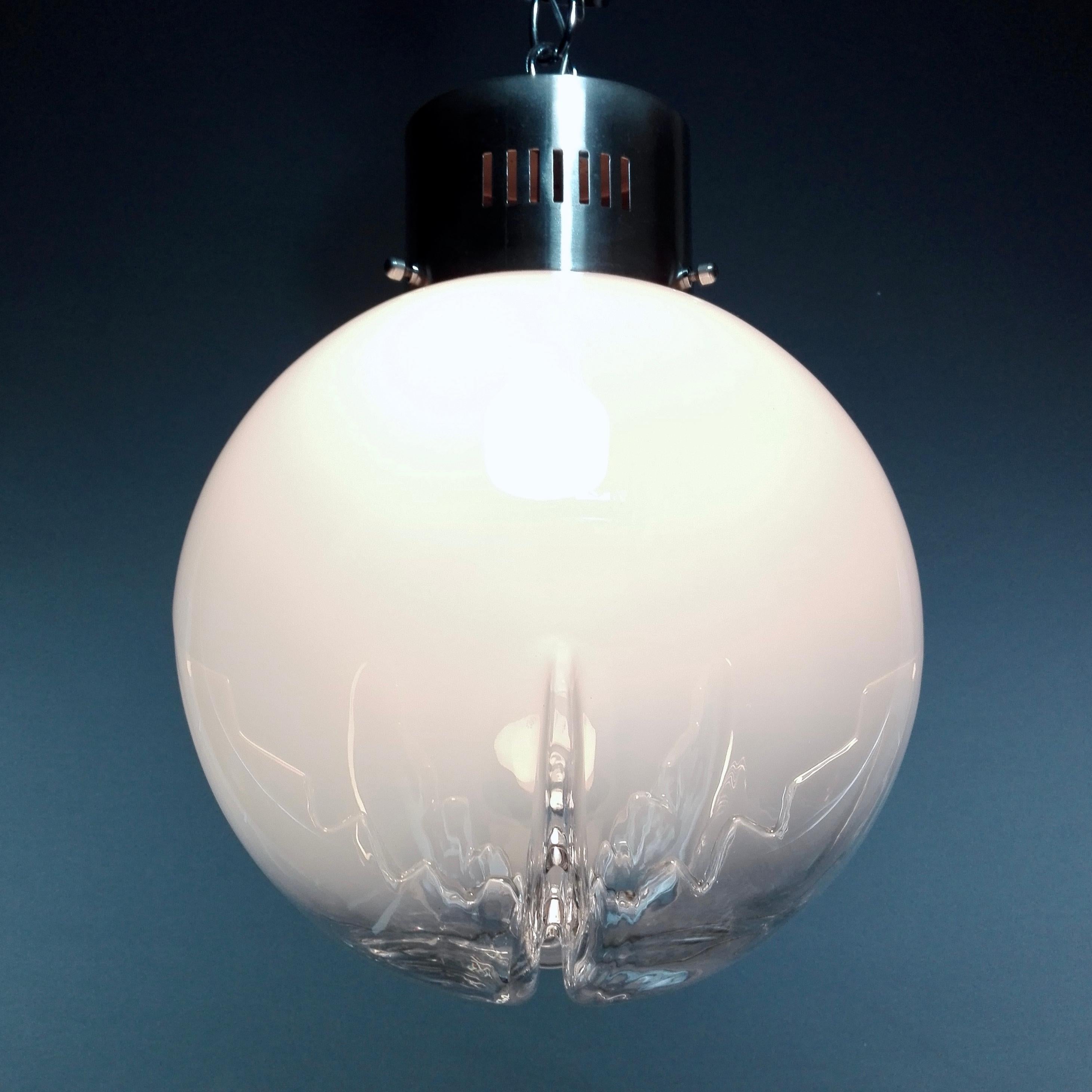 Hand-Crafted 1970s Mazzega Murano attributed hand-blown clear and milky glass pendant lamp. 
