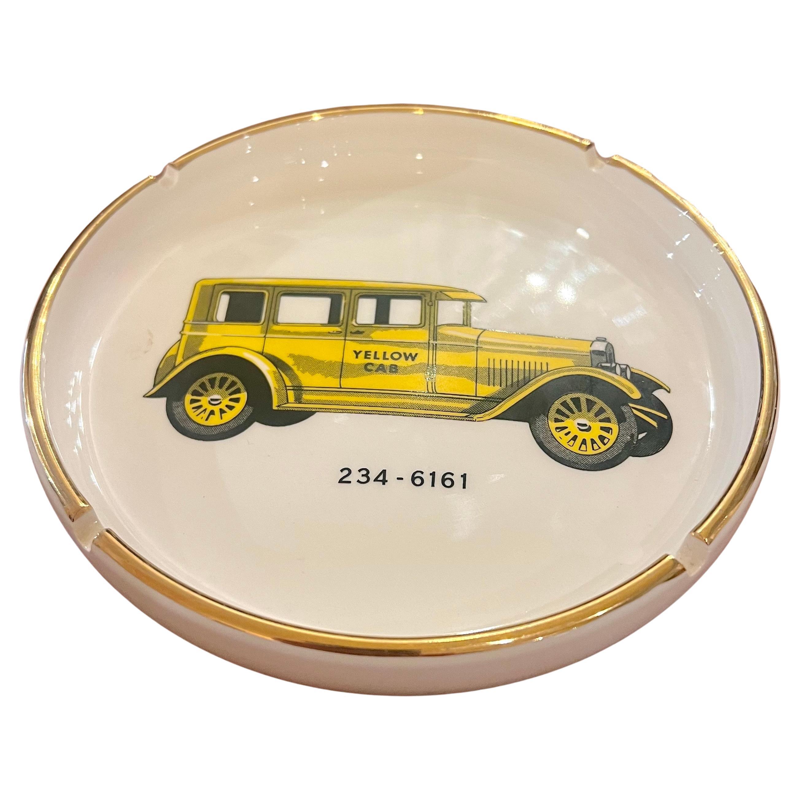 beautiful elegant large ashtray by Jack Nadel of California circa 1970's with gold trim porcelain finish excellent condition almost no wear no chips or cracks .