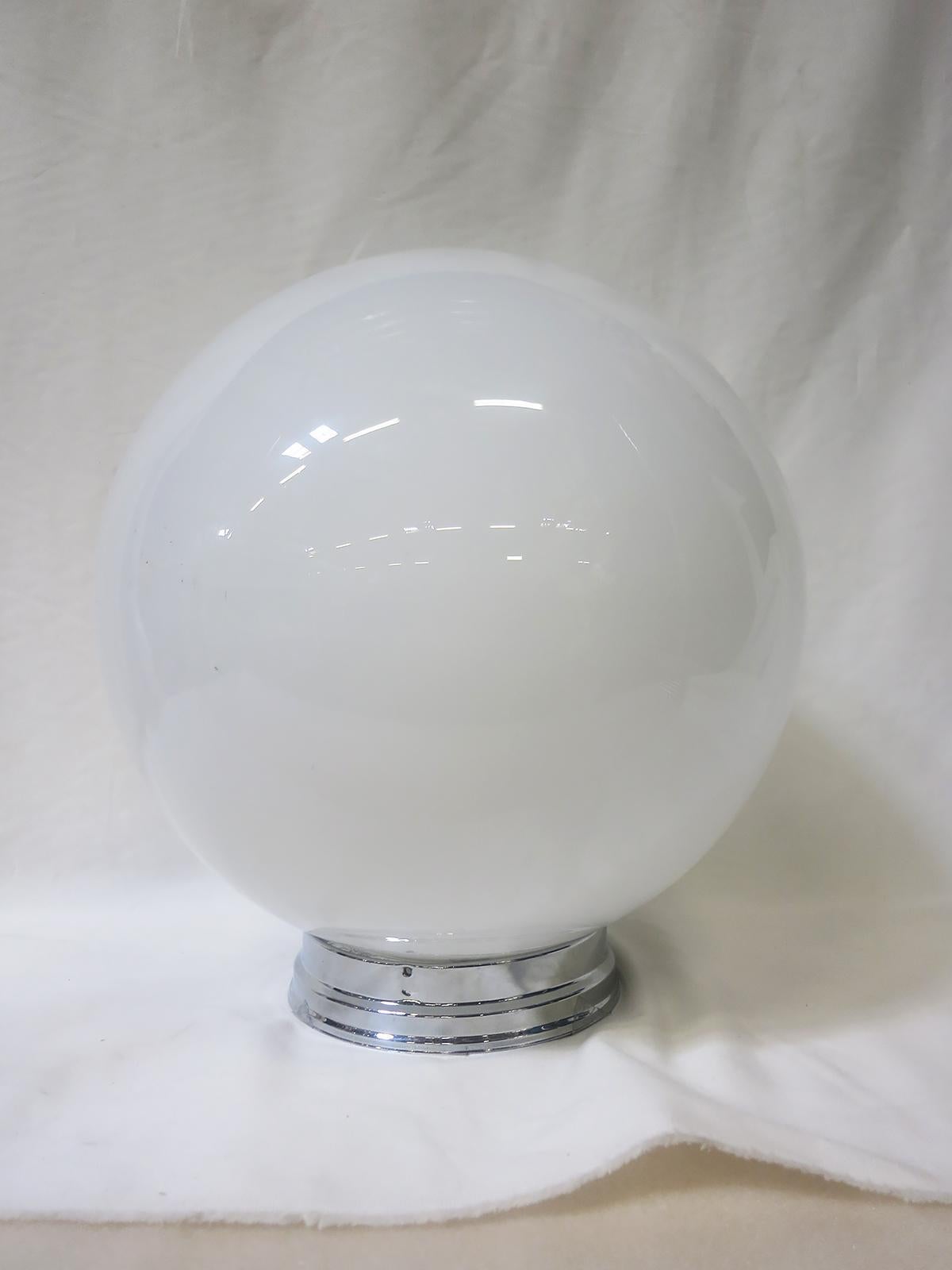 Our retro globe features a Classic sphere shape in white milk glass that will add timeless flair to any room in your home. Available with a new brass or chrome 6