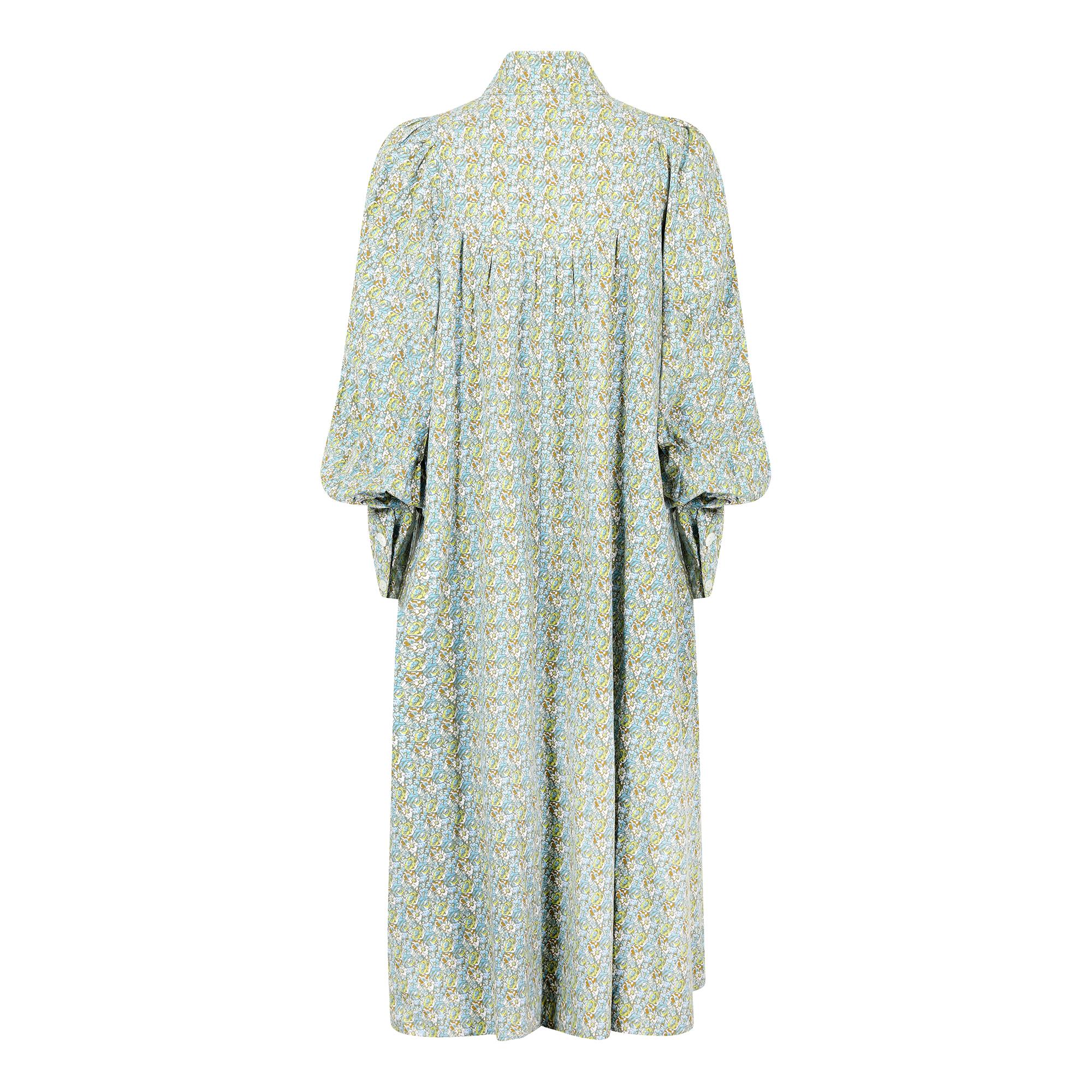 Laura Ashley was the most famous name on the British High Street from the late 1960s and throughout the 1970s.  The textile founded company made some fantastic and fabulous quality clothing taking inspiration from bygone eras. This dress is styled