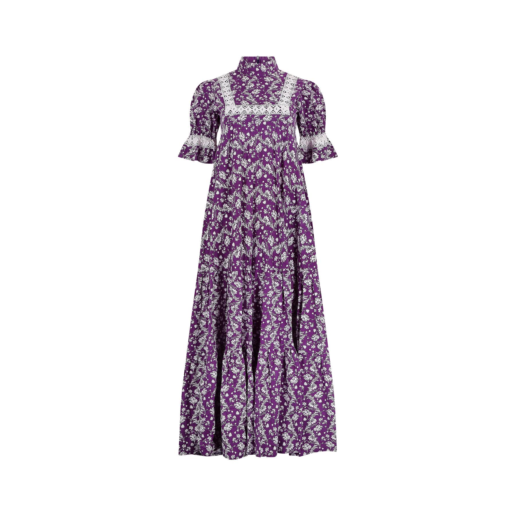 This is the classic early 1970s floral design that catapulted Laura Ashley into the darling of the British High Street. We've sold this dress many times over the years but never in this striking purple and white combination. It is made from a medium