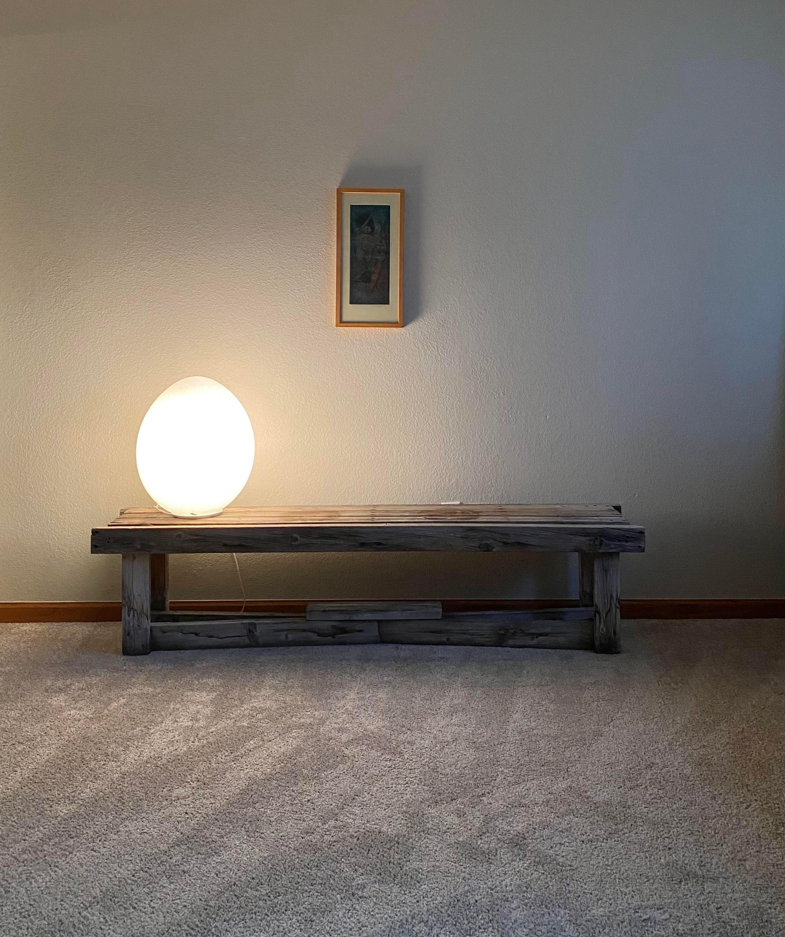 Sculptural, large, egg lamp (model V-1318) by the Laurel Lamp Company with Italian white frosted glass globe, circa, 1977. This Minimalist lamp features a frosted Italian glass, hand-blown sculpted globe (original sticker remains). When unlit, the