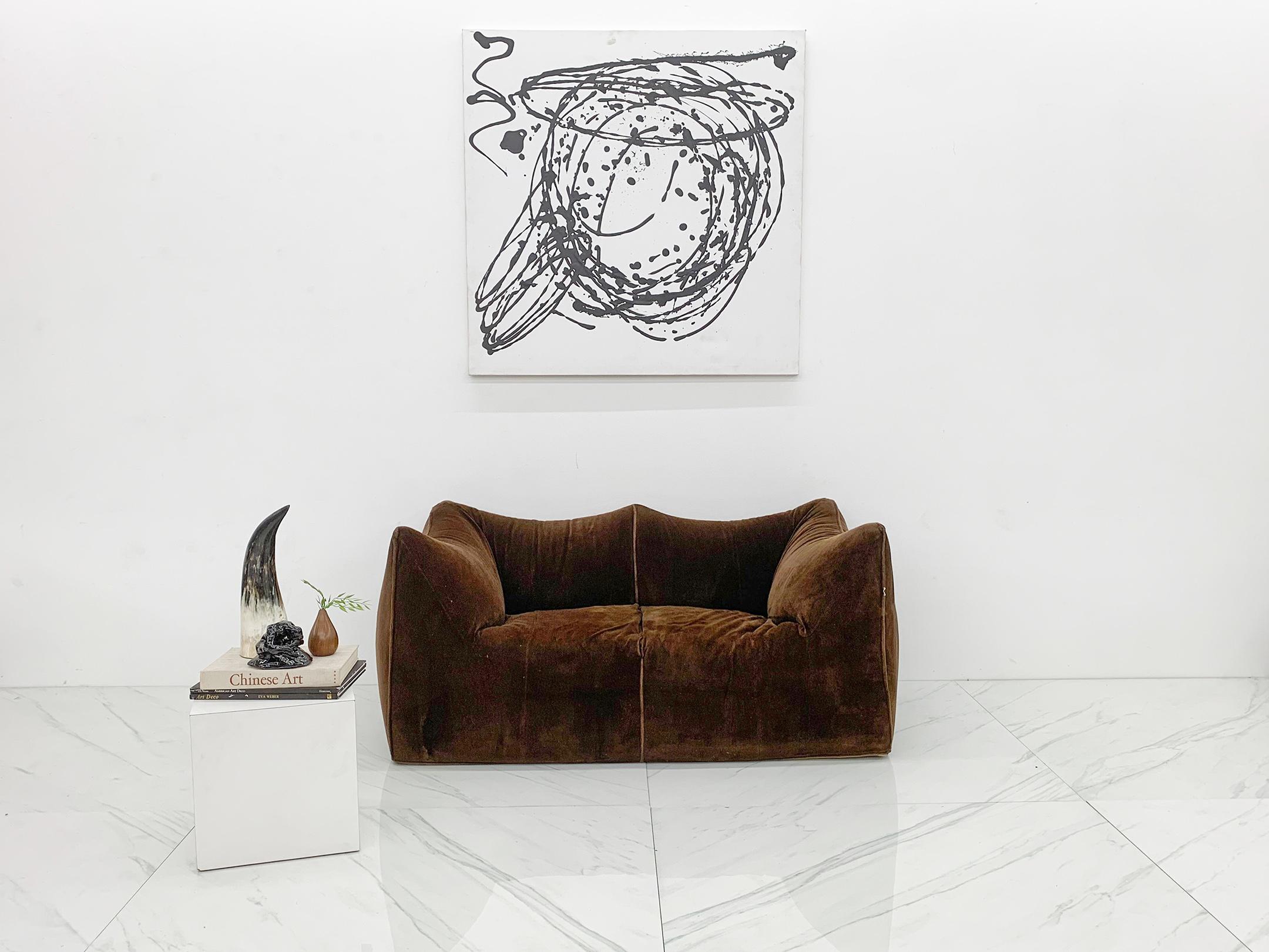 Such a gorgeous piece of modernism, this Le Bambole sofa was designed by Mario Bellini for B&B Italia in the 1970's. This example is upholstered in original chocolate mohair. It's playful shape, modern design and insane comfortability have garnered