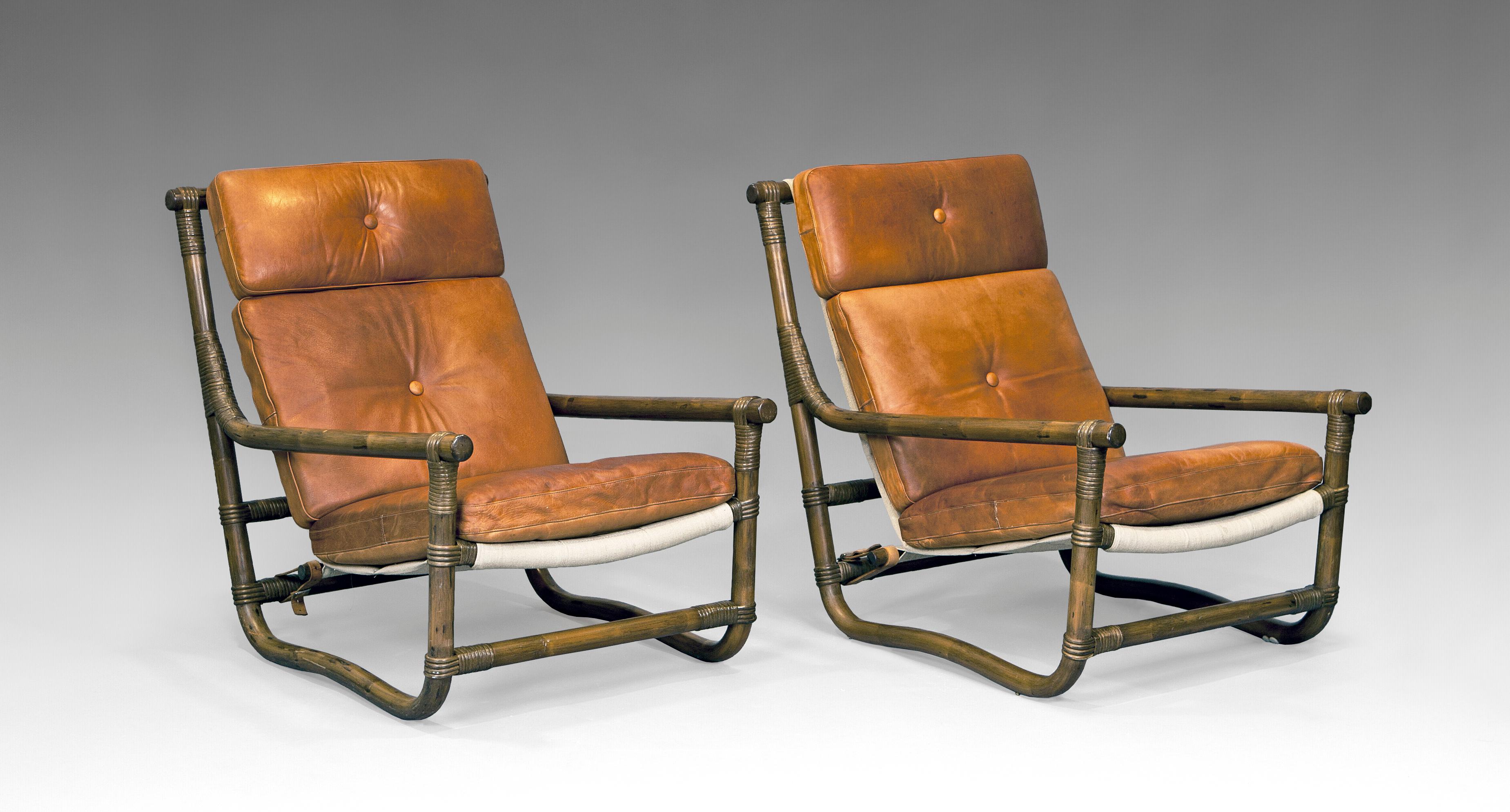 Pair of easy chairs in leather and bamboo. Sweden, 1970’s. Leather and bamboo structure in magnificent original state.