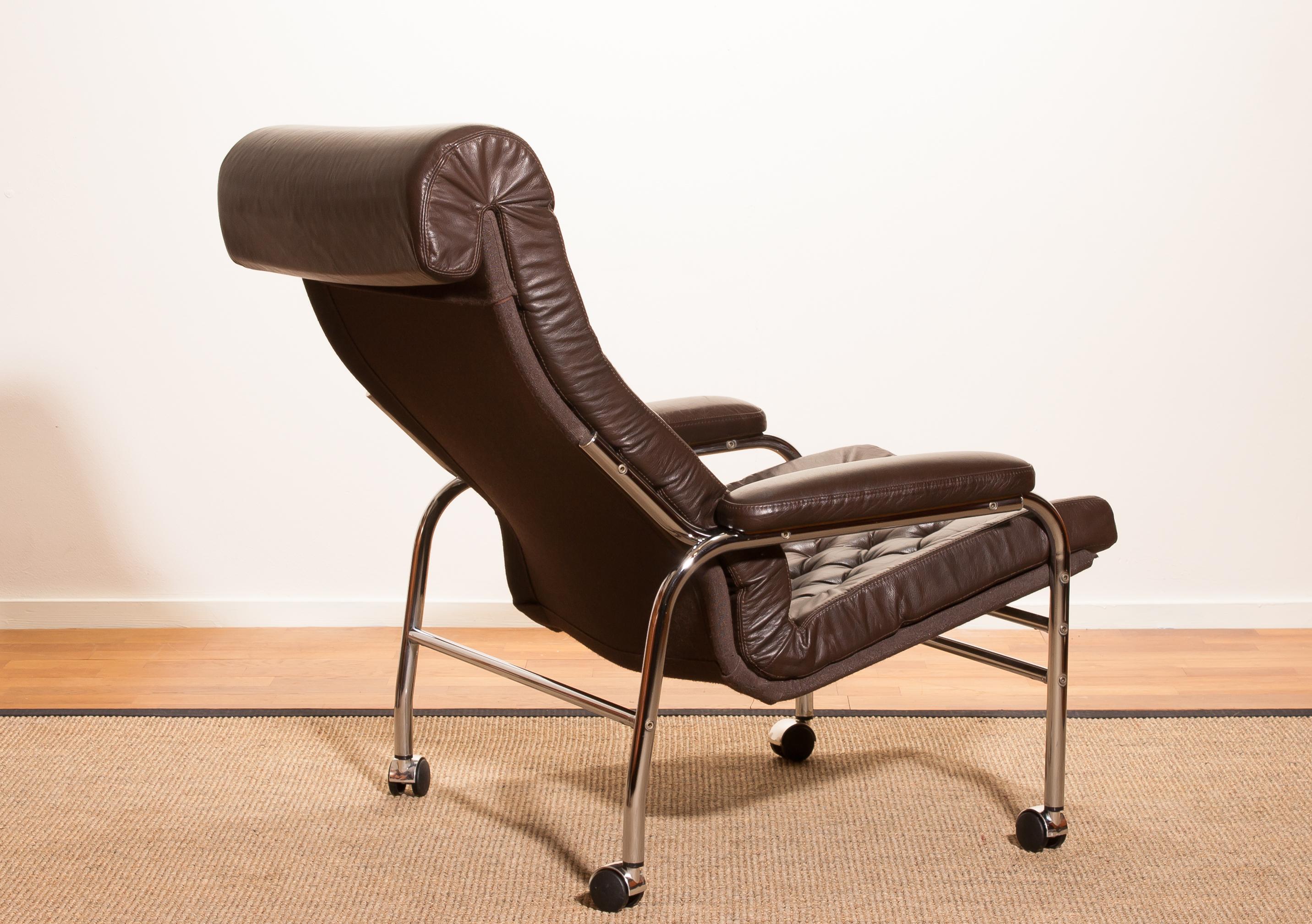 Beautiful and rare lounge chair designed by Noboru Nakamura, Sweden.
This chair has a dark brown leather seating on a chromed tubular wheeled frame.
It is in a mint condition,
circa 1970s
Dimensions: H 90 cm x W 78 cm x D 93 cm x SH 40 cm.