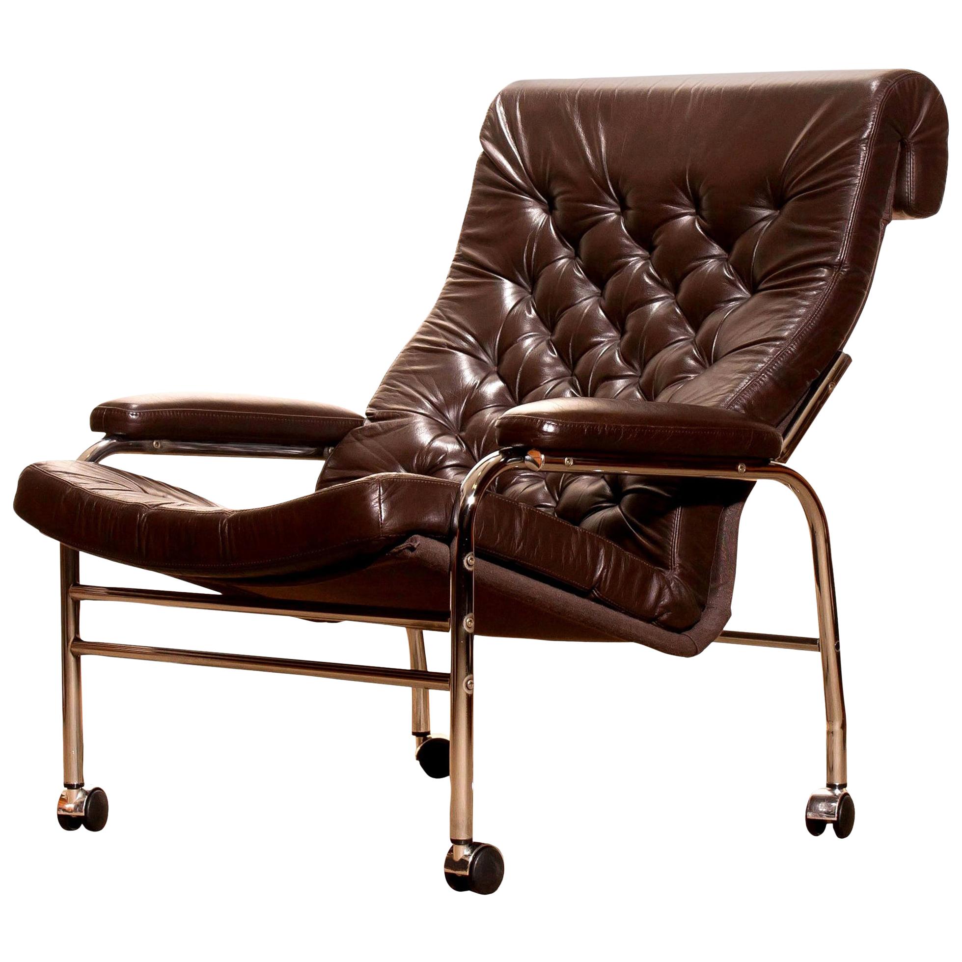 Beautiful and rare lounge chair designed by Noboru Nakamura, Sweden.
This chair has a dark brown leather seating on a chromed tubular wheeled frame.
It is in a mint condition,
circa 1970s.
Dimensions: H 90 cm x W 78 cm x D 93 cm x SH 40 cm.