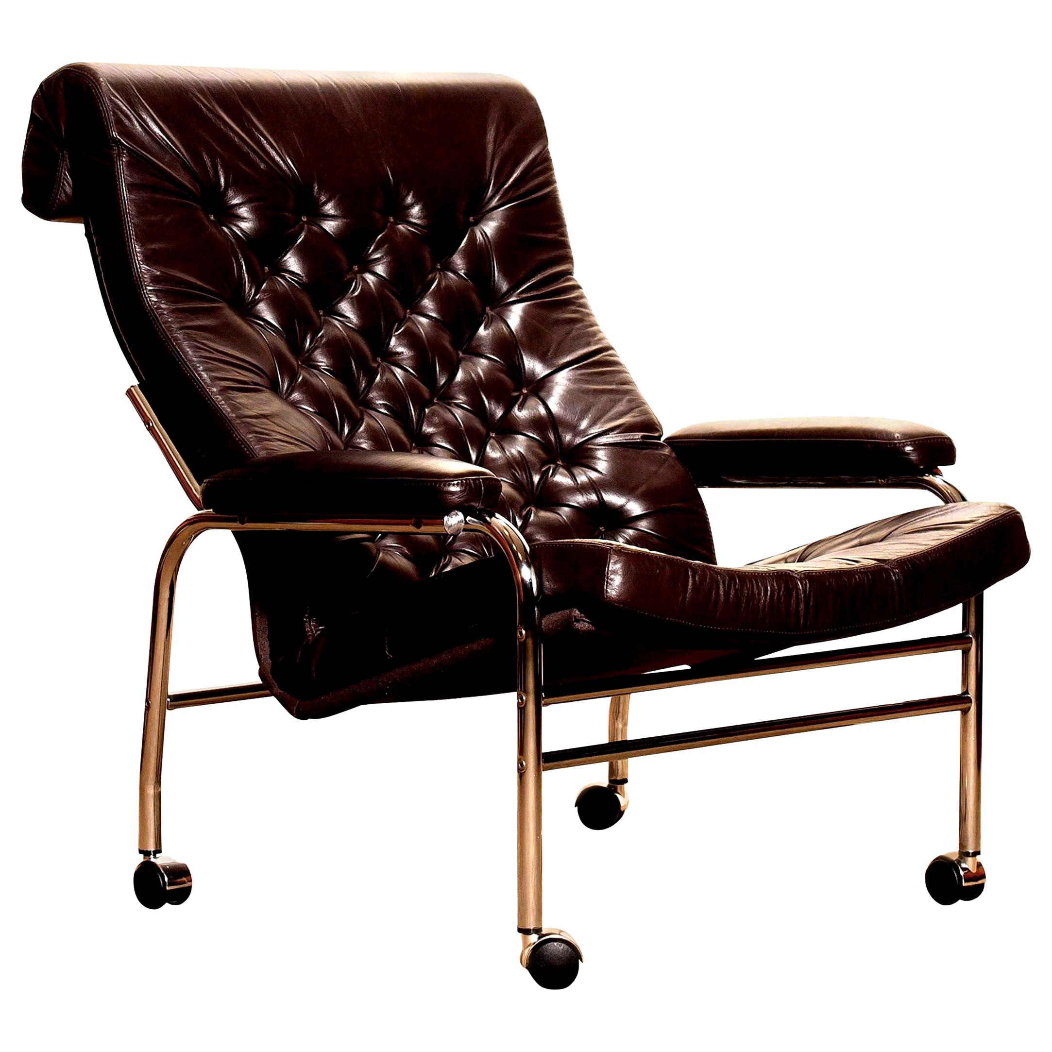 Beautiful and rare lounge chair designed by Noboru Nakamura, Sweden.
This chair has a dark brown leather seating on a chromed tubular wheeled frame.
It is in a mint condition,
circa 1970s.
Dimensions: H 90 cm x W 78 cm x D 93 cm x SH 40 cm.