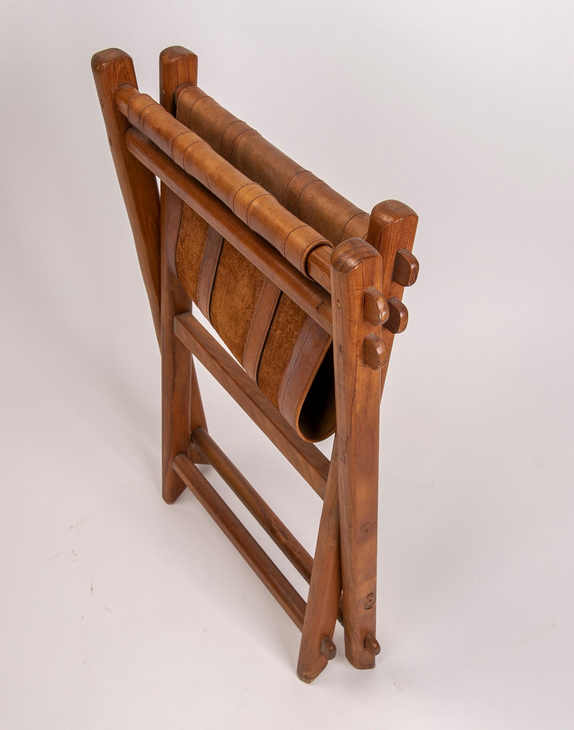 1970s leather and wooden folding chair.
