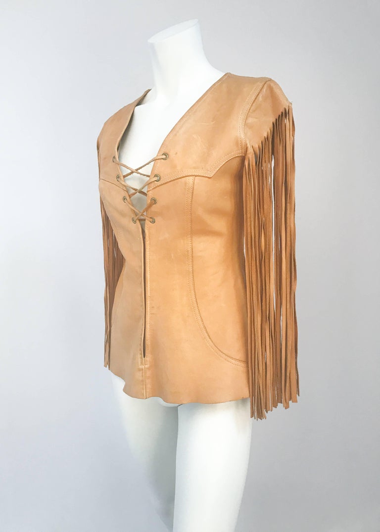 1970's Leather Top with Fringe Sleeves at 1stDibs