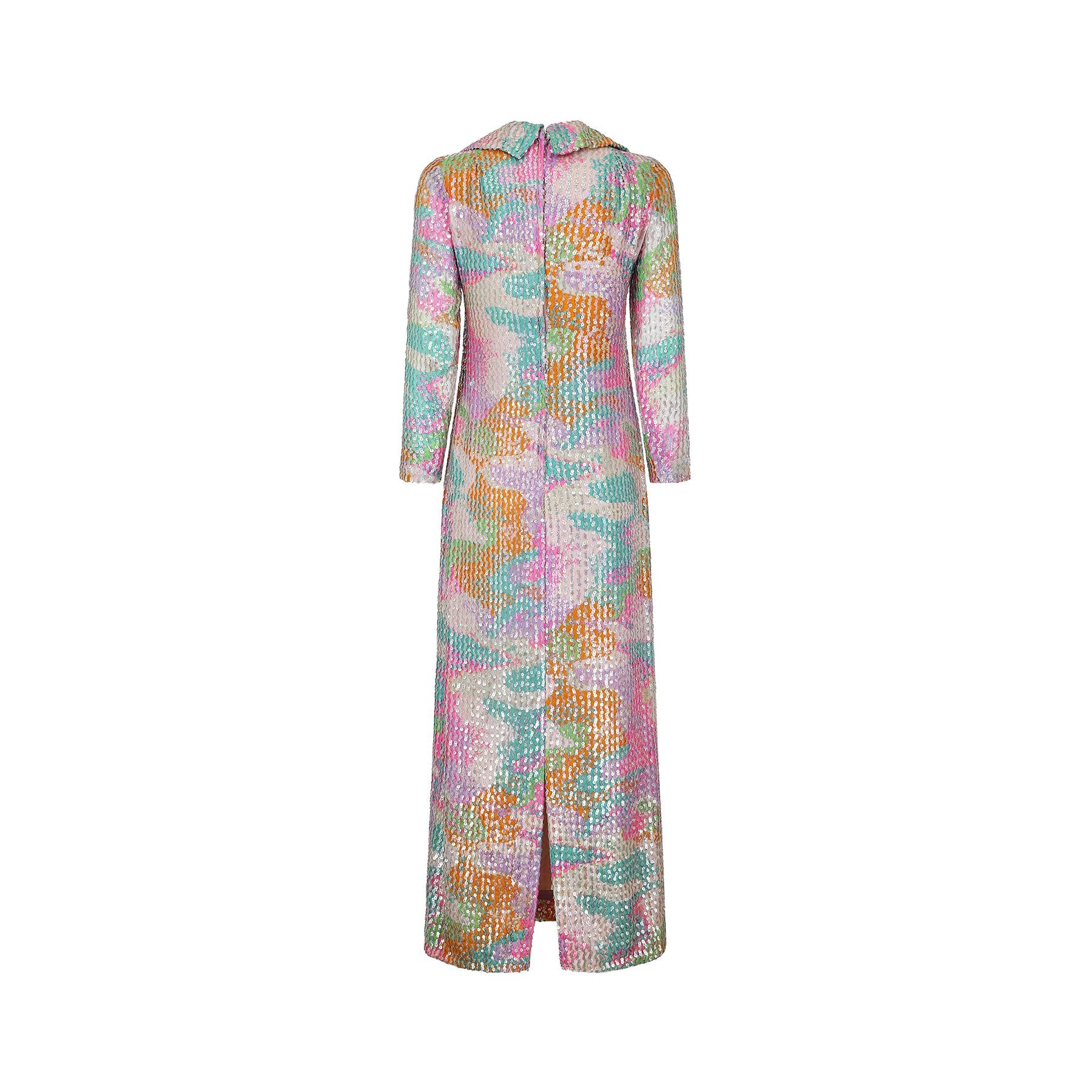 Superb quality Lee Jordan of New York all over floral sequinned three quarter length column dress.  Lee Jordan made very high end department store occasion wear for the affluent American market from the 1960s through to the 1980s.  This dress is