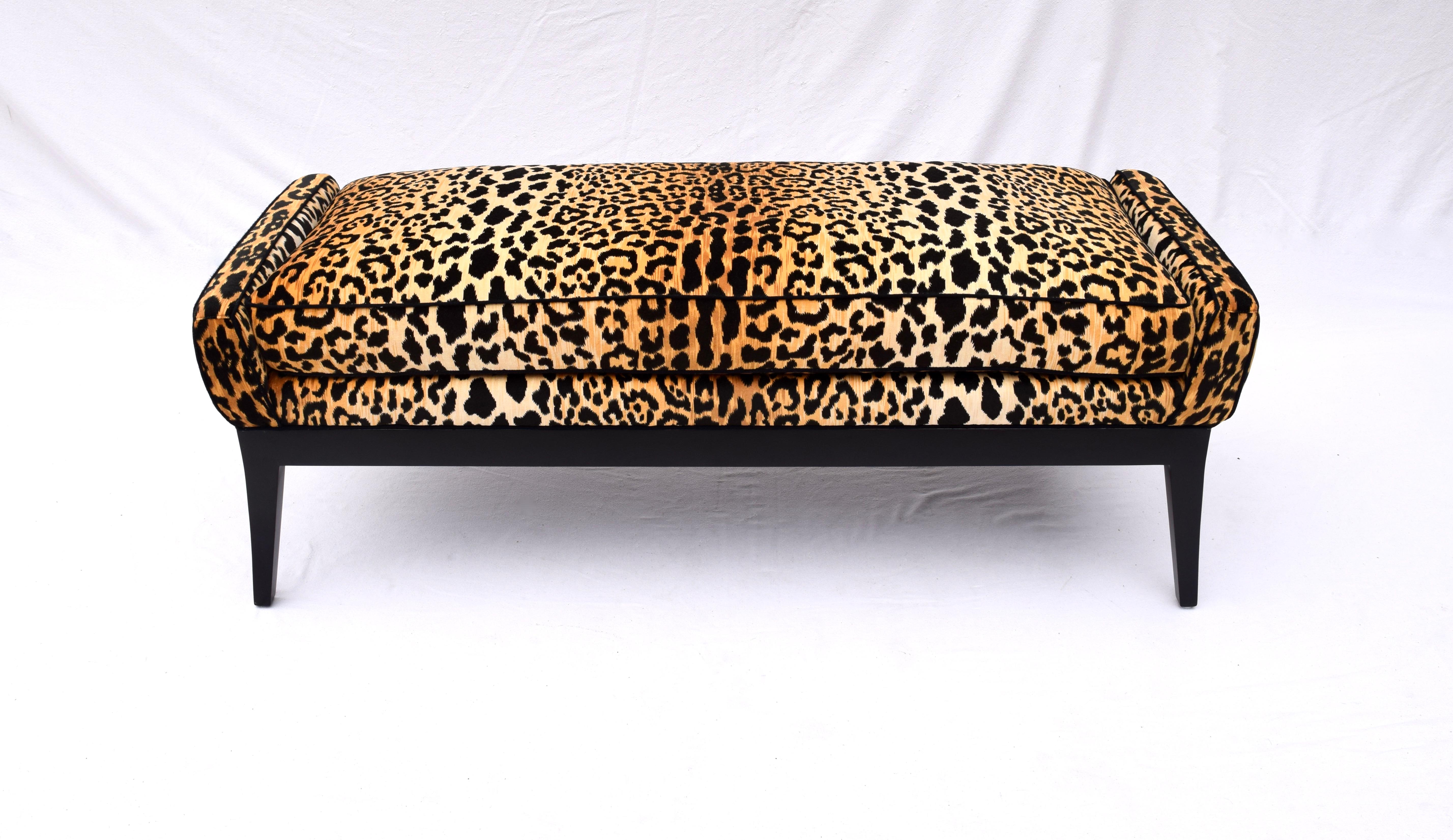 Fully restored Mid-Century Modern window bench attributed to Edward Wormley for Dunbar. Splay leg design constructed of newly black lacquered hardwood frame. Stationary plush single cushion is upholstered in leopard velvet accented with black welt