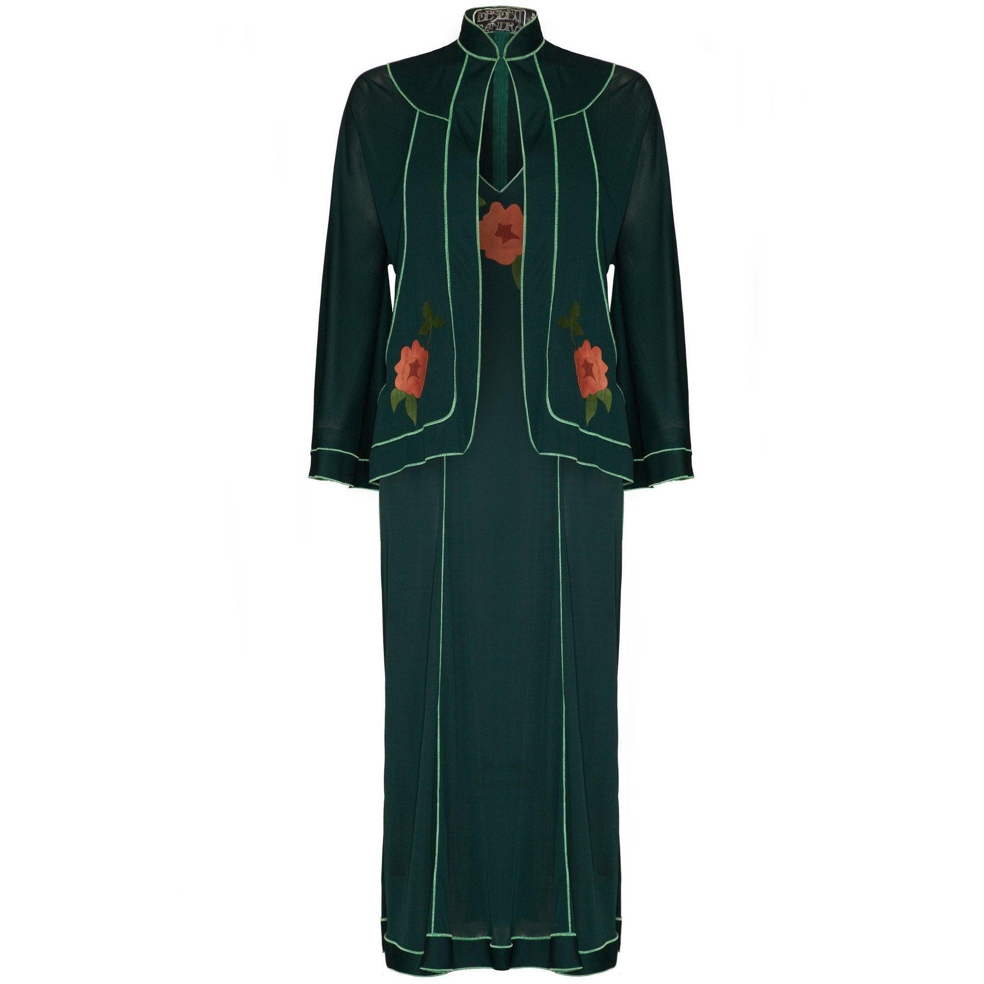 This bewitching 1970s ensemble in moss green jersey by British designer Lesley Sandra who's elegant, feminine designs were hugely popular with stockists such as Selfriges and Harvey Nichols during this era. This decorative set features pale green