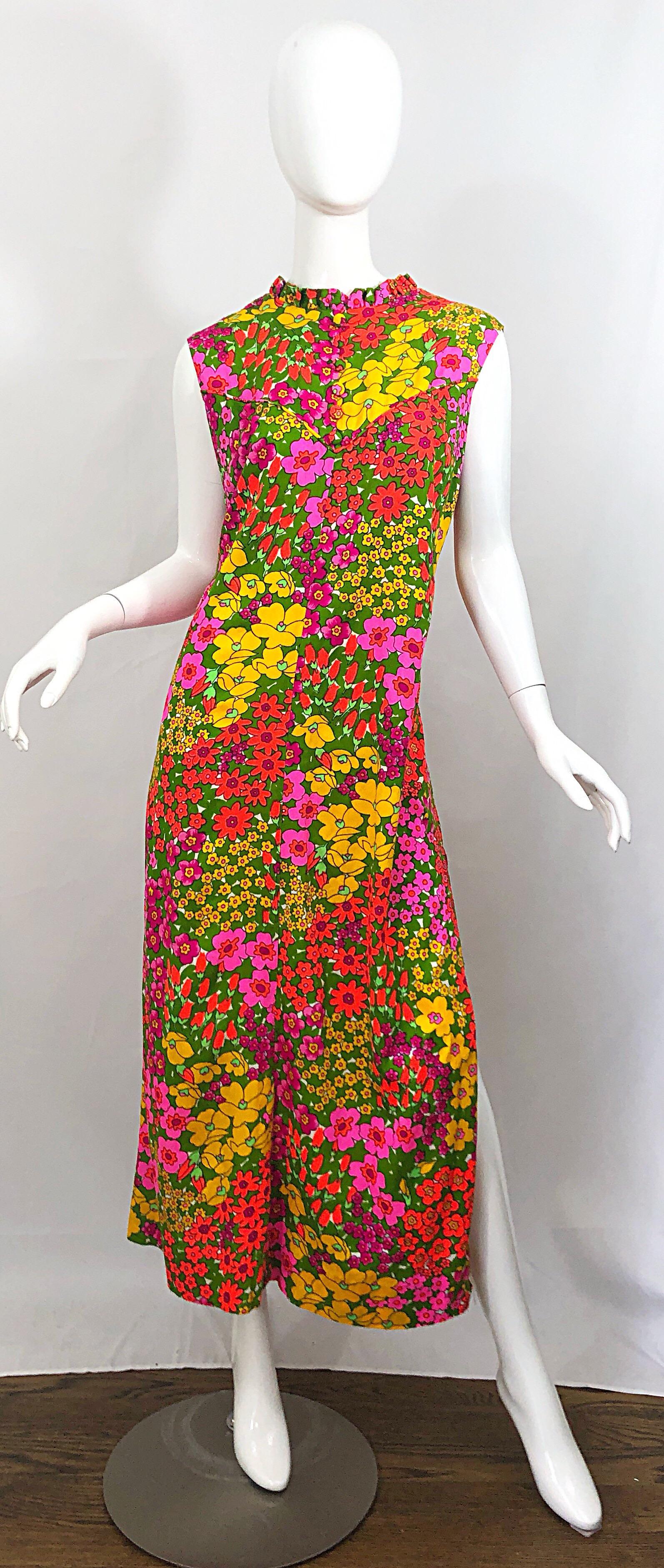 Incredible LIBERTY HOUSE 1970s plus size (current 16/18) colorful neon flower print cotton / rayon maxi dress! Features vibrant colors of hot pink, neon green, orange and yellow throughout. Chic ruffled collar with mock buttons up the center neck.