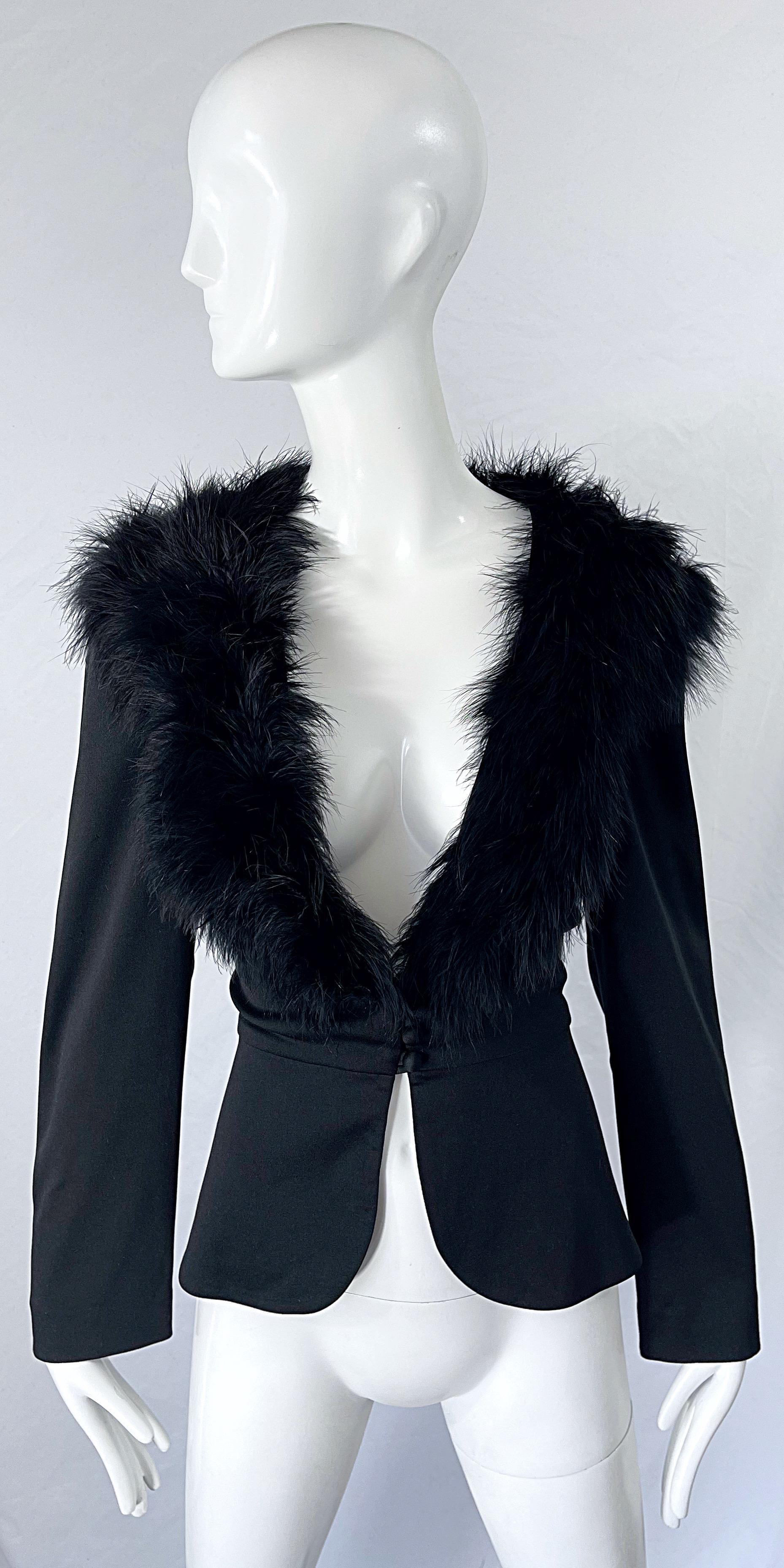 Chic early 70s LILLI DIAMOND black jersey marabou feather encrusted long sleeve cardigan top ! Features a tailored fit with buttons up the front center. Can easily be dressed up or down. Great with jeans, a skirt, shorts or over a dress.
In great