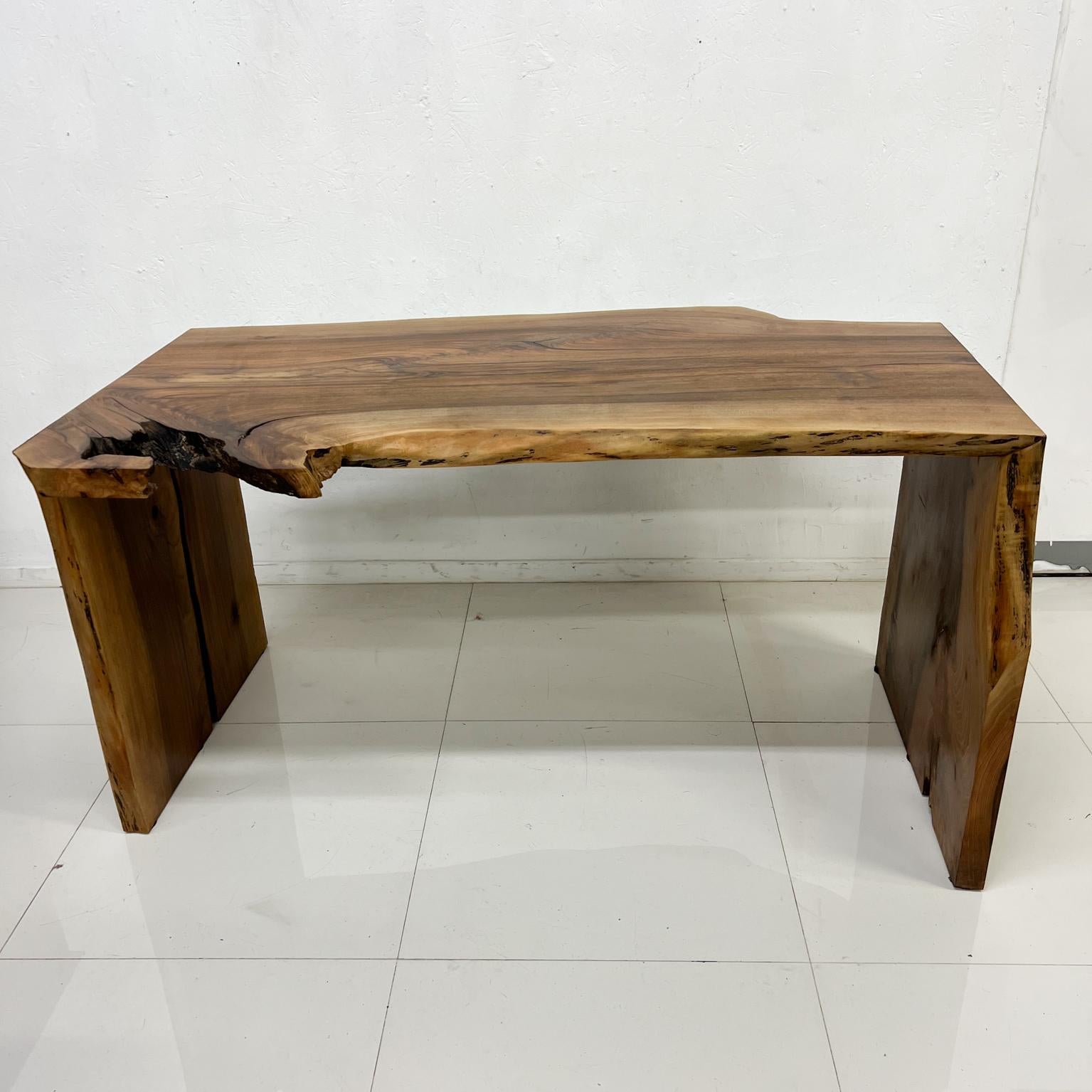 Custom Desk in natural Walnut wood, Live edge Waterfall Form, inspiration George Nakashima.
Desk 55.75 w x 34 d x 28.25 tall, Knee clearance 26 tall x 52 w
Maker information unknown.
Handcrafted firm and sturdy. Original Preowned condition.
Delivery
