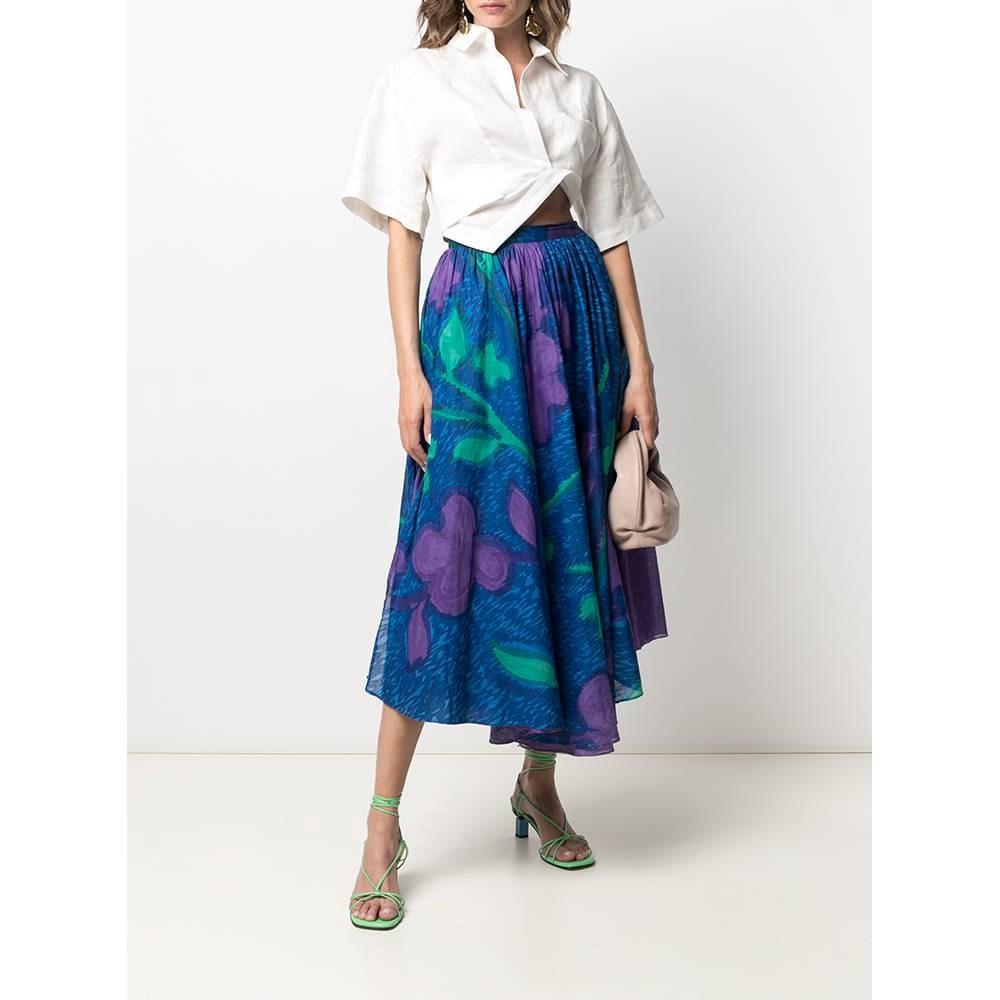 Livio De Simone blue cotton midi skirt with green and purple abstract print. Side buttons closure and side welt pockets.

Size: 8 UK

Flat measurements
Height: 85 cm
Waist: 33 cm
Hips: 56 cm

Product code: A7182
Composition: 100% Cotton
Made in: