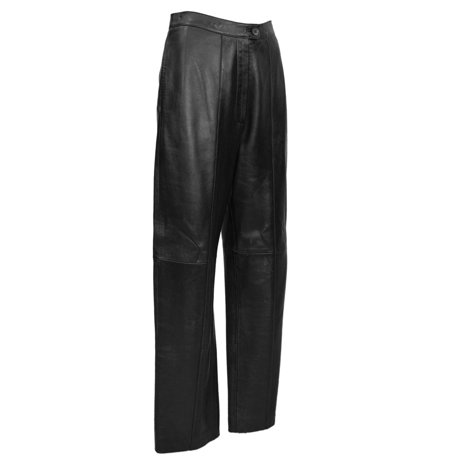 Fabulous pair of butter soft black leather Loewe pants from the 1970s. Highwaisted with a single black button closure with zipper fly. Side slit pockets. Designed to be straight through the leg and slightly cropped and hit just above the ankle.