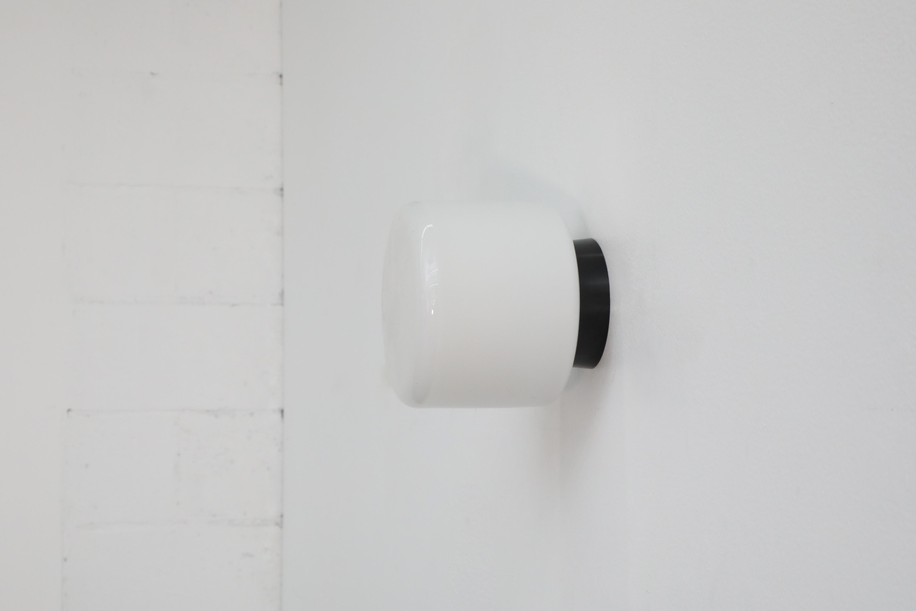 1970's LOM Style Rounded Pillbox Wall Sconce with Large Milk Glass Shade In Good Condition For Sale In Los Angeles, CA