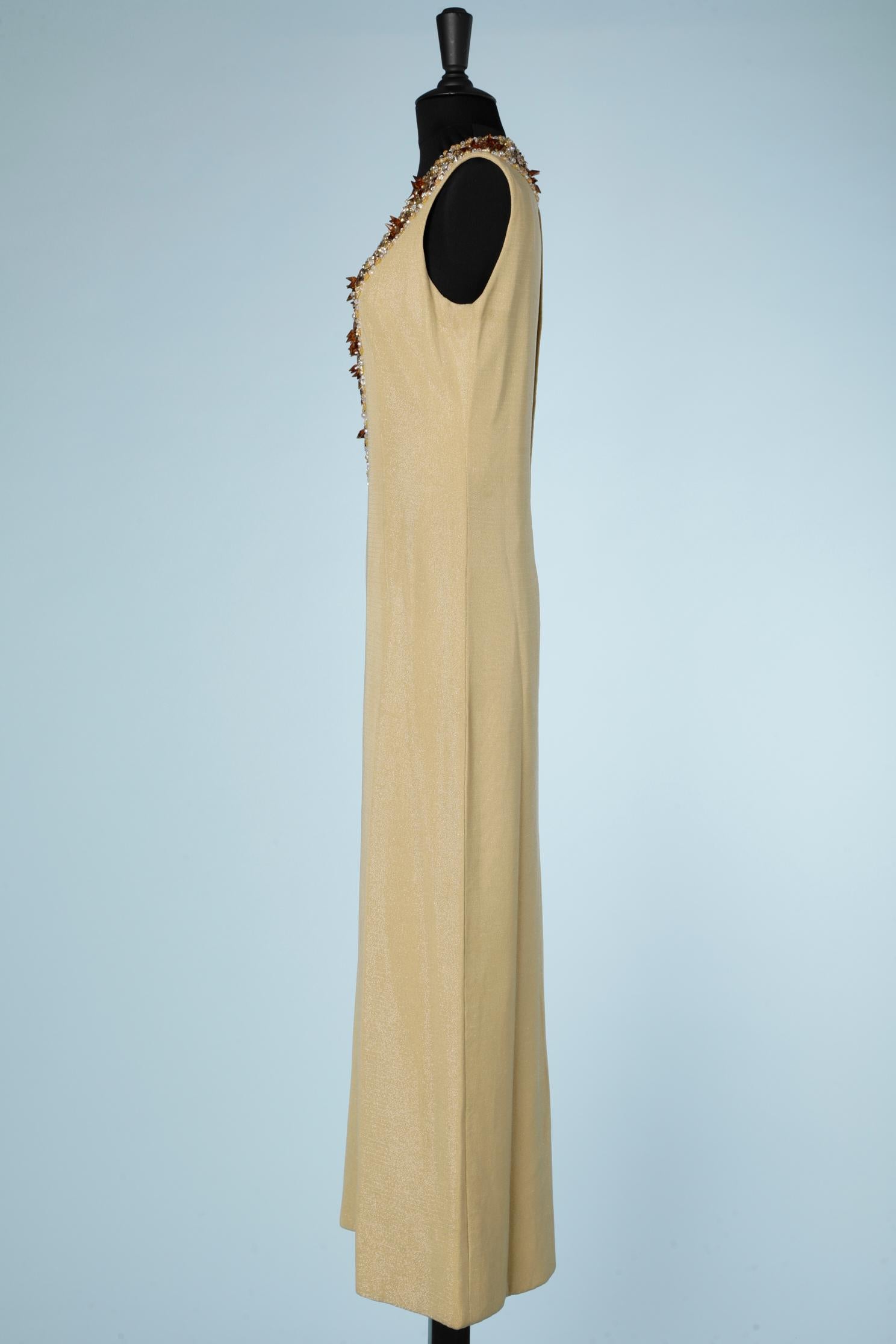 Women's 1970's long gold jersey lurex dress with beaded neckline 