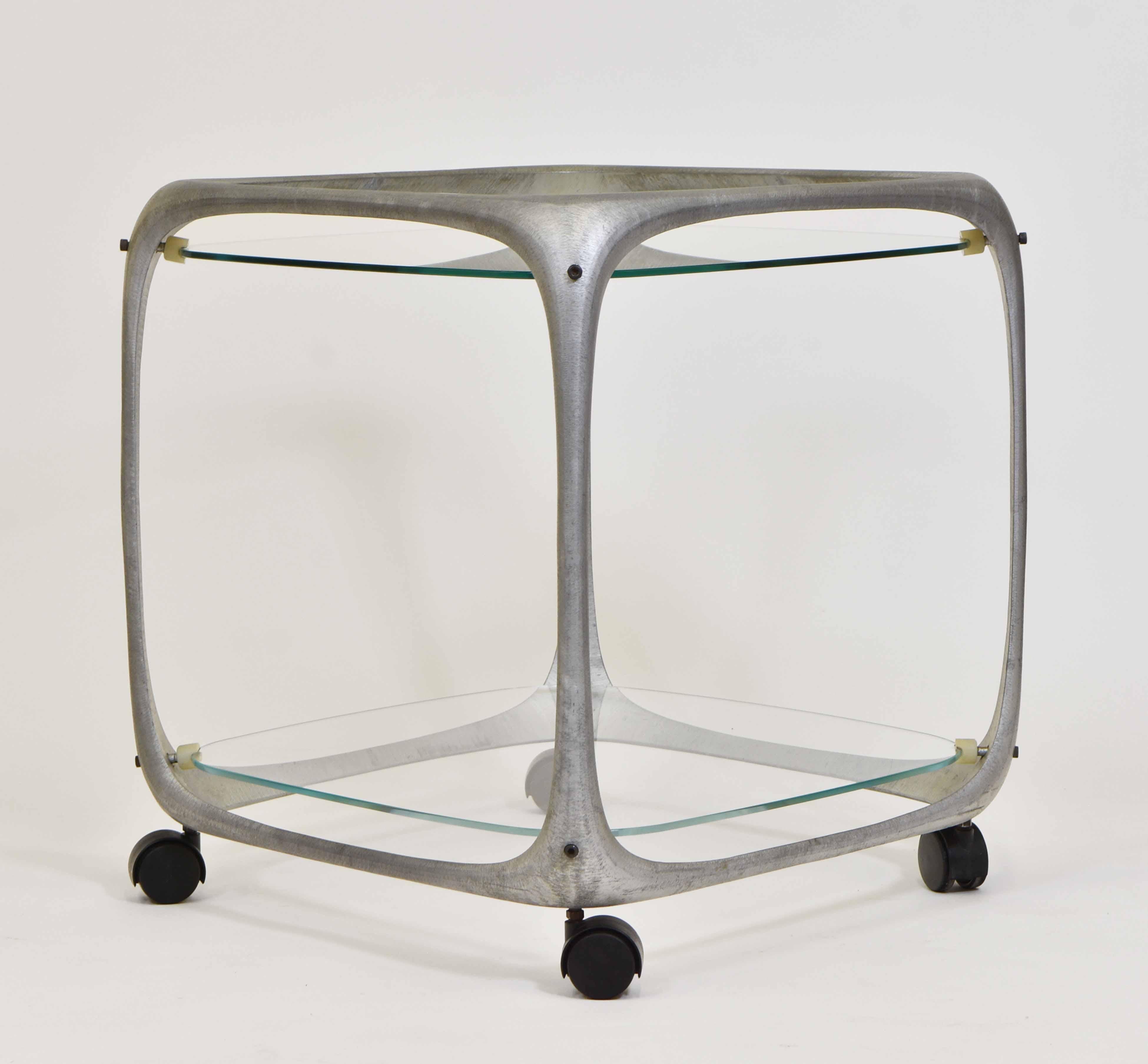 A fabulous cube form textured aluminium bar trolley, designed by Lorenzo Burchiellaro. Italy - Circa 1970s. Stamped 'burchiellaro'.

*Free delivery for all areas in mainland England & Wales only. Delivery to room of choice by a two person team.