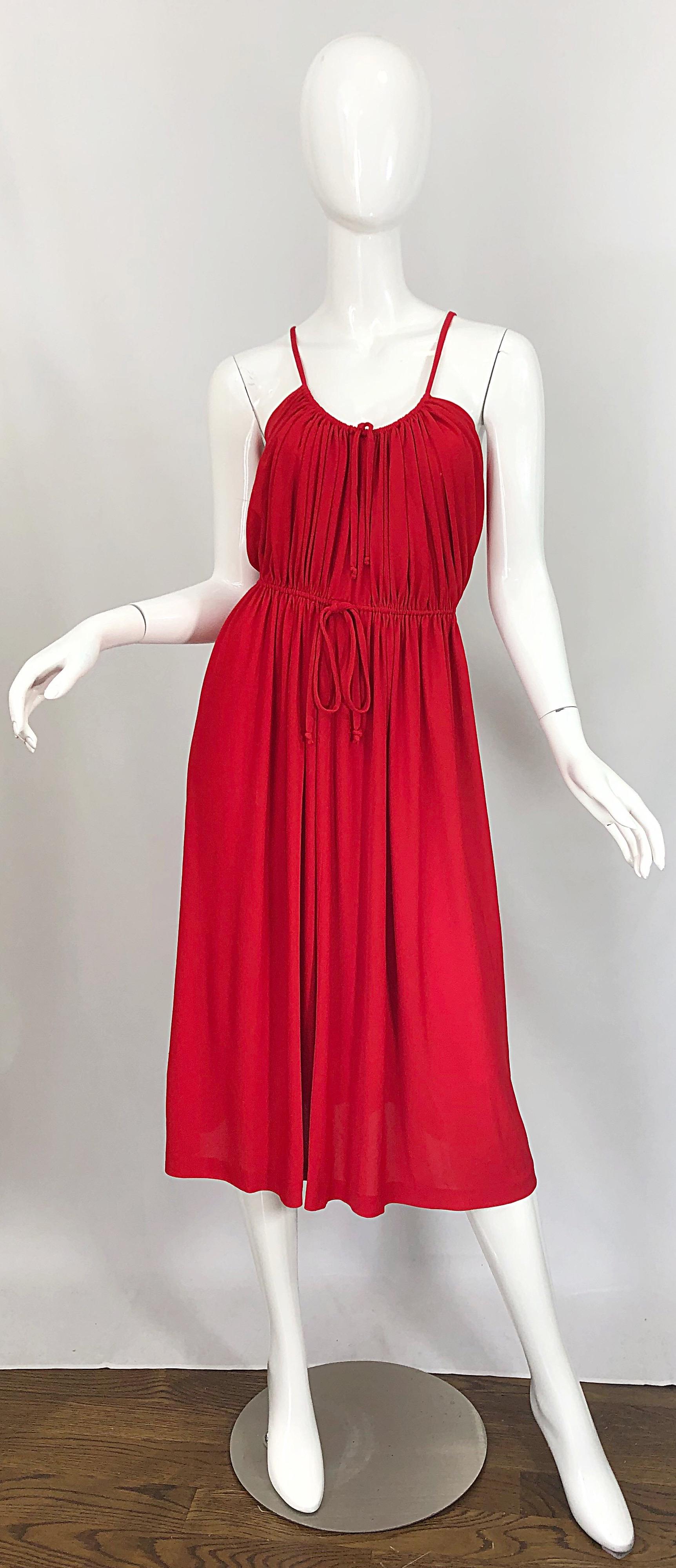 Chic 1970s LORIS AZZARO crimson red silk jersey Grecian Inspired spaghetti strap dress! Features flattering and forgiving draped bodice with ties at the bodice and waist to adjust for size. Avant Garde triangular back. Hidden metal zipper up the