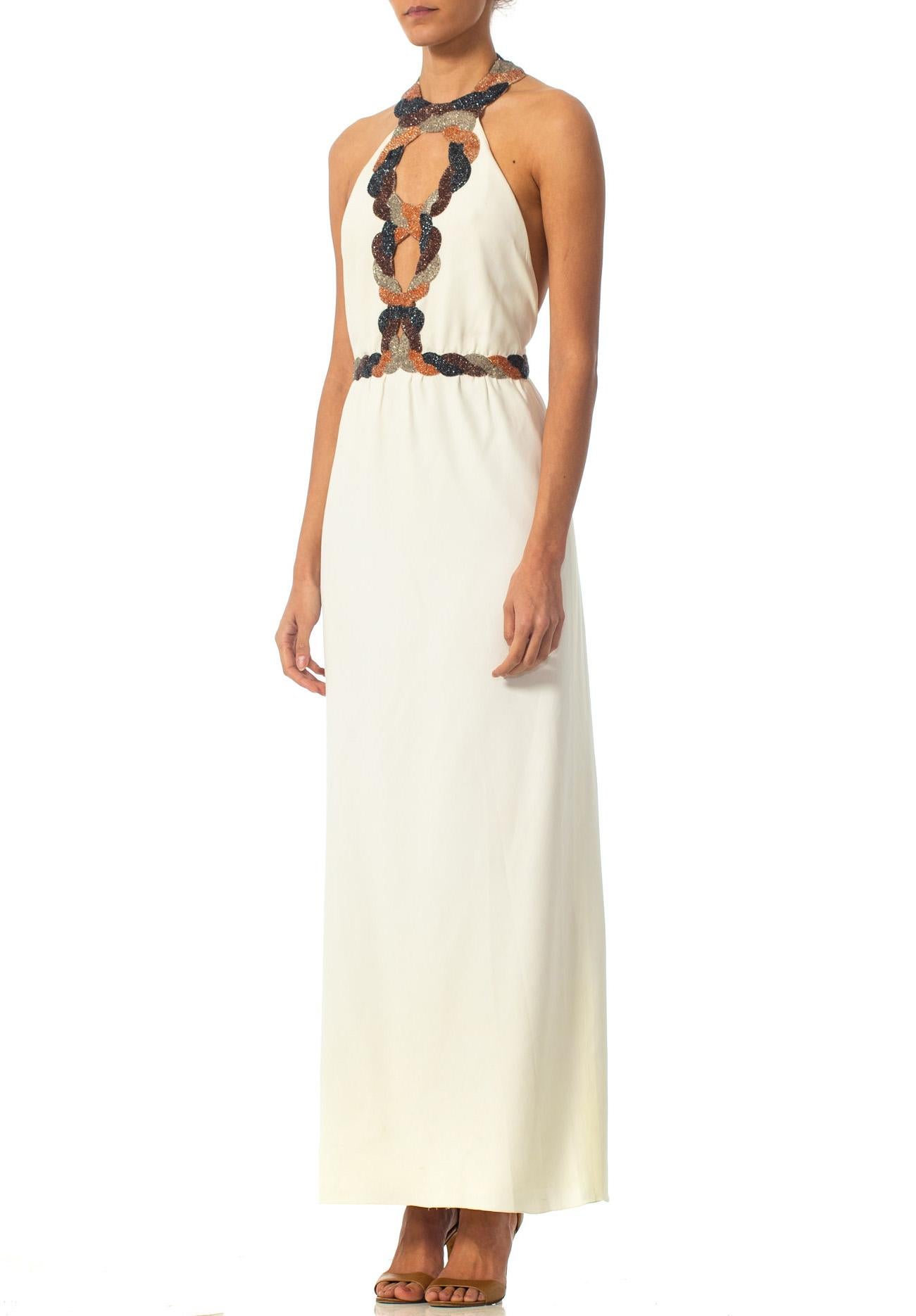 1970S Loris Azzaro Ivory Hand Beaded Silk Crepe Backless Halter Gown With Cut-Ou In Excellent Condition In New York, NY