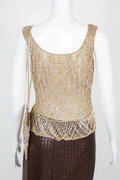 Conjunto de cota de malla metálica Loris Azzaro 1973