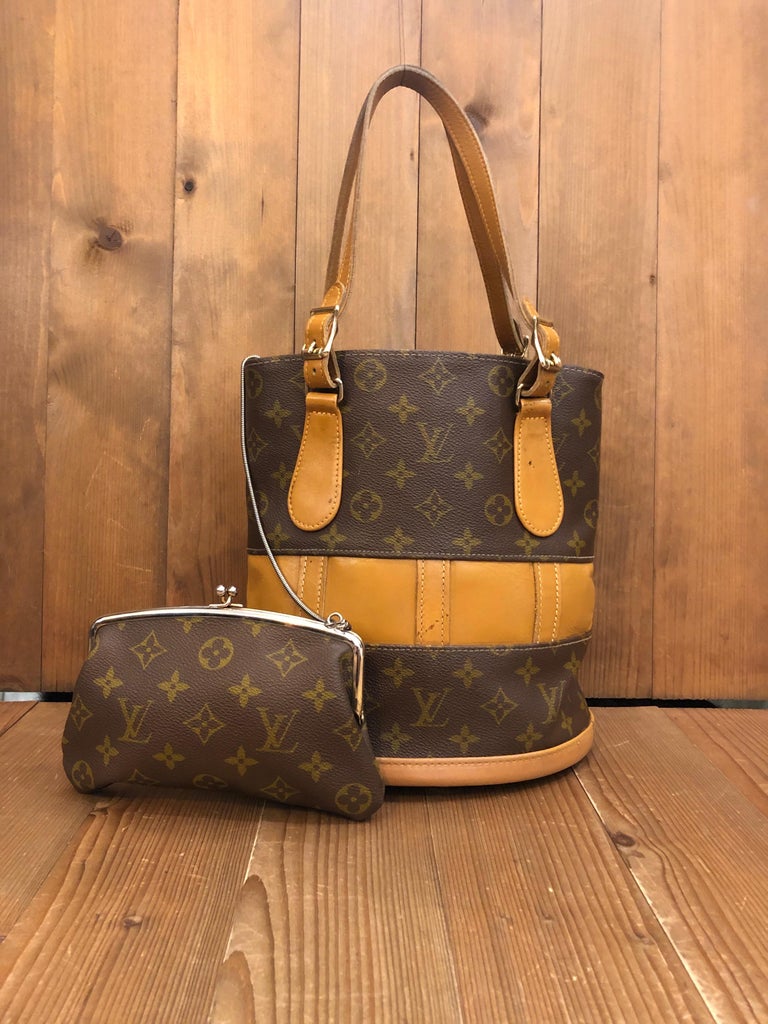 Sold at Auction: Louis Vuitton, Louis Vuitton Vintage Bucket Bag with Duster