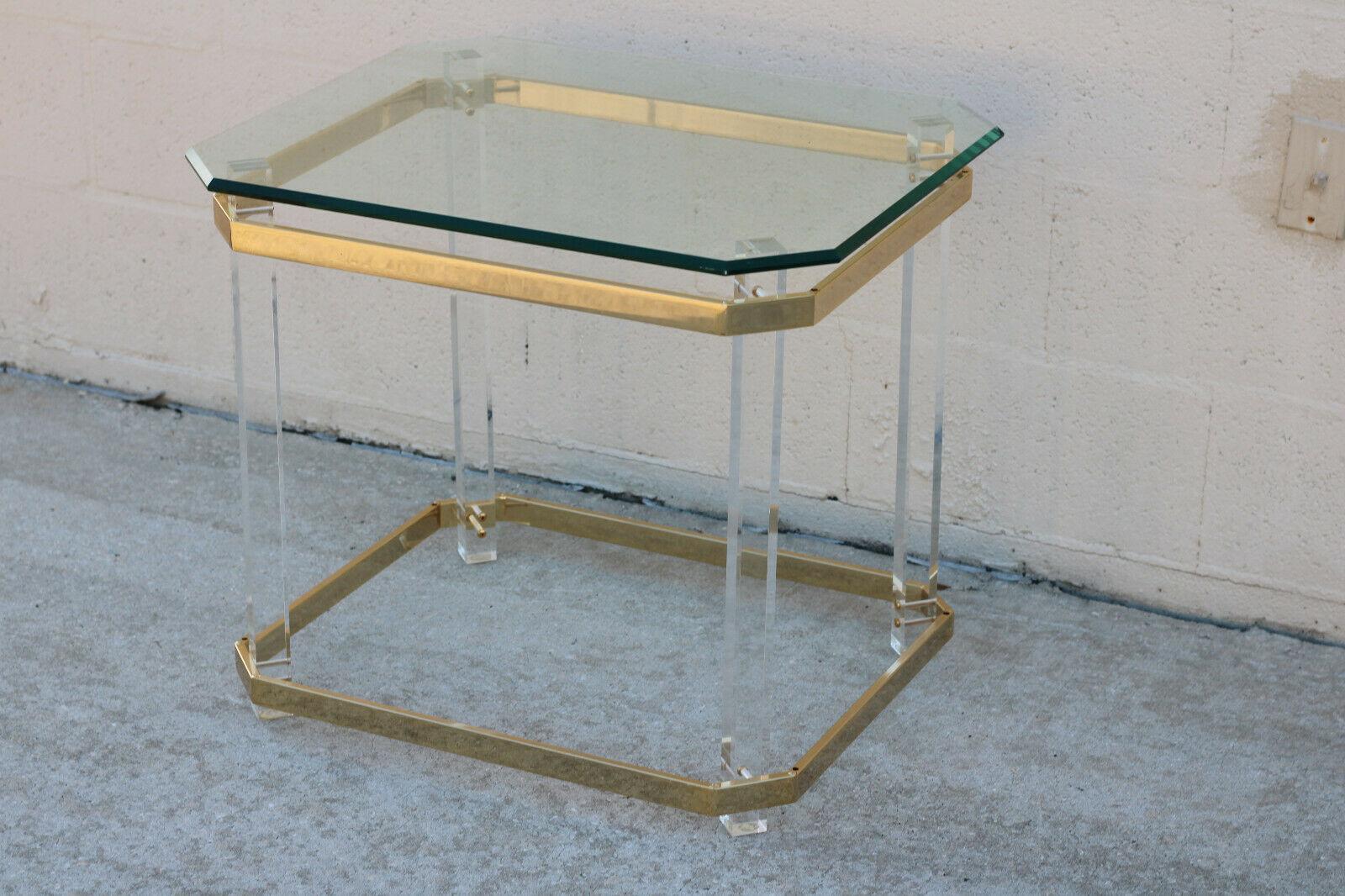 Vintage 1970s Lucite Brass and Glass Side Table after Charles Hollis Jones in Hollywood Regency or Mid-Century Modern Style

Lucite has a natural transparency, providing a beautifully clean look, and it doesn’t add any visual clutter. Side table is