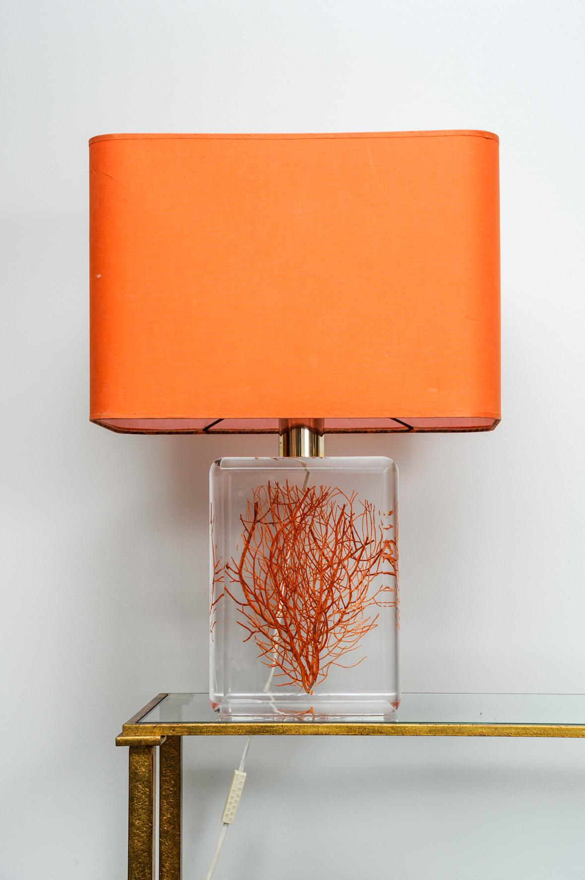 Lamp in Lucite with a red coral.
Original shade , circa 1970.