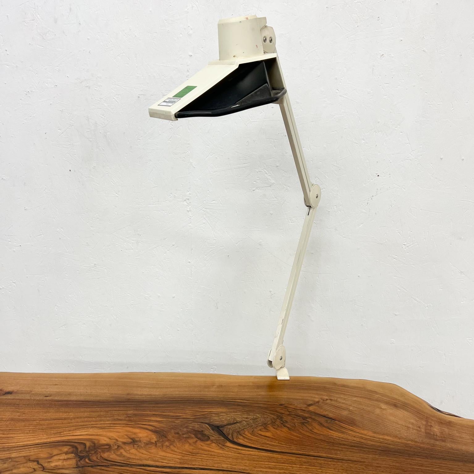 1970s By Luxo Industrial Metal Architect Task clamp lamp for desk
Design attributed to Jacob Jacobsen (Finland)
Fully adjustable articulating.
Very unusual task lamp.
Tested and currently working.
Stamped with maker's information.
32.5 tall x.