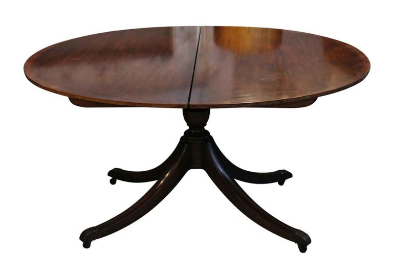1970s Mahogany Duncan Phyfe Style Oval Dining Table with Two Extensions on Wheel at 1stDibs