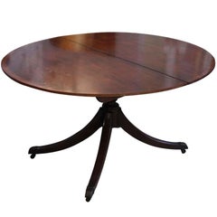 1970s Mahogany Duncan Phyfe Style Oval Dining Table with Two Extensions on Wheel