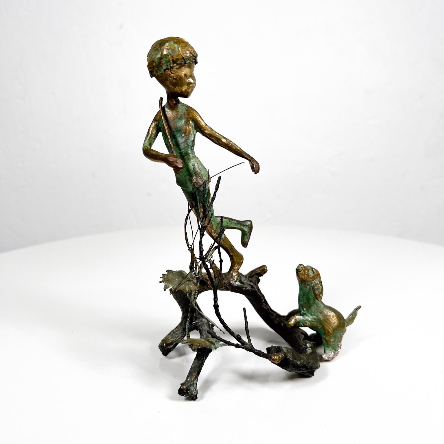 Art of Malcolm Moran patinated bronze sculpture: boy on tree branch with his dog
Verdigris patinated bronze.
Signed art
7 Tall x 5.5 W x 3 D
Original preowned unrestored vintage condition.
See our images provided.