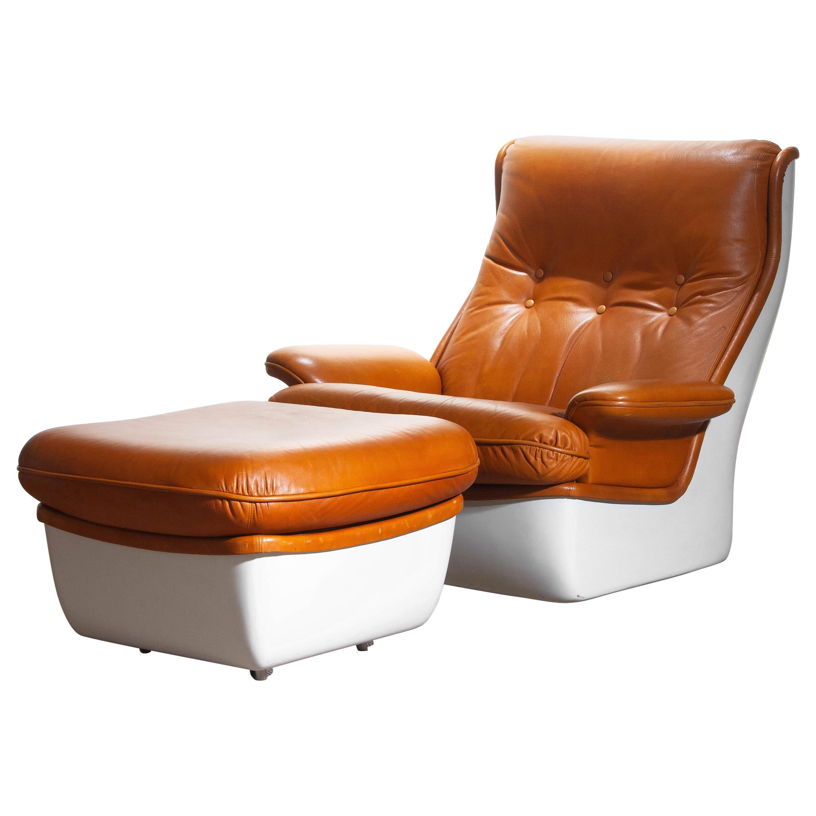 French 1970s, Marc Held Airborne Lounge / Easy Chair and Ottoman in Cognac Leather