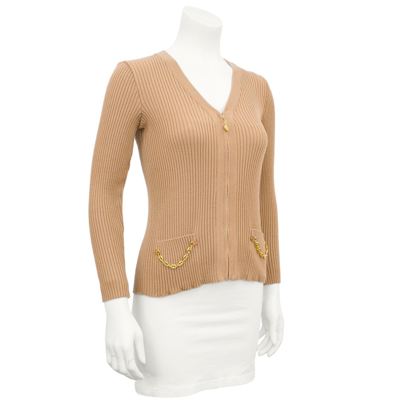 1970's Italian luxury brand Marelli ribbed wool cardigan. Tan wool with gold metal zip front. Gilt metal Marelli logo tag tops the zipper. Each patch pocket is enhanced with swagged gold metal chain inspired the Gucci oval link so popular in the