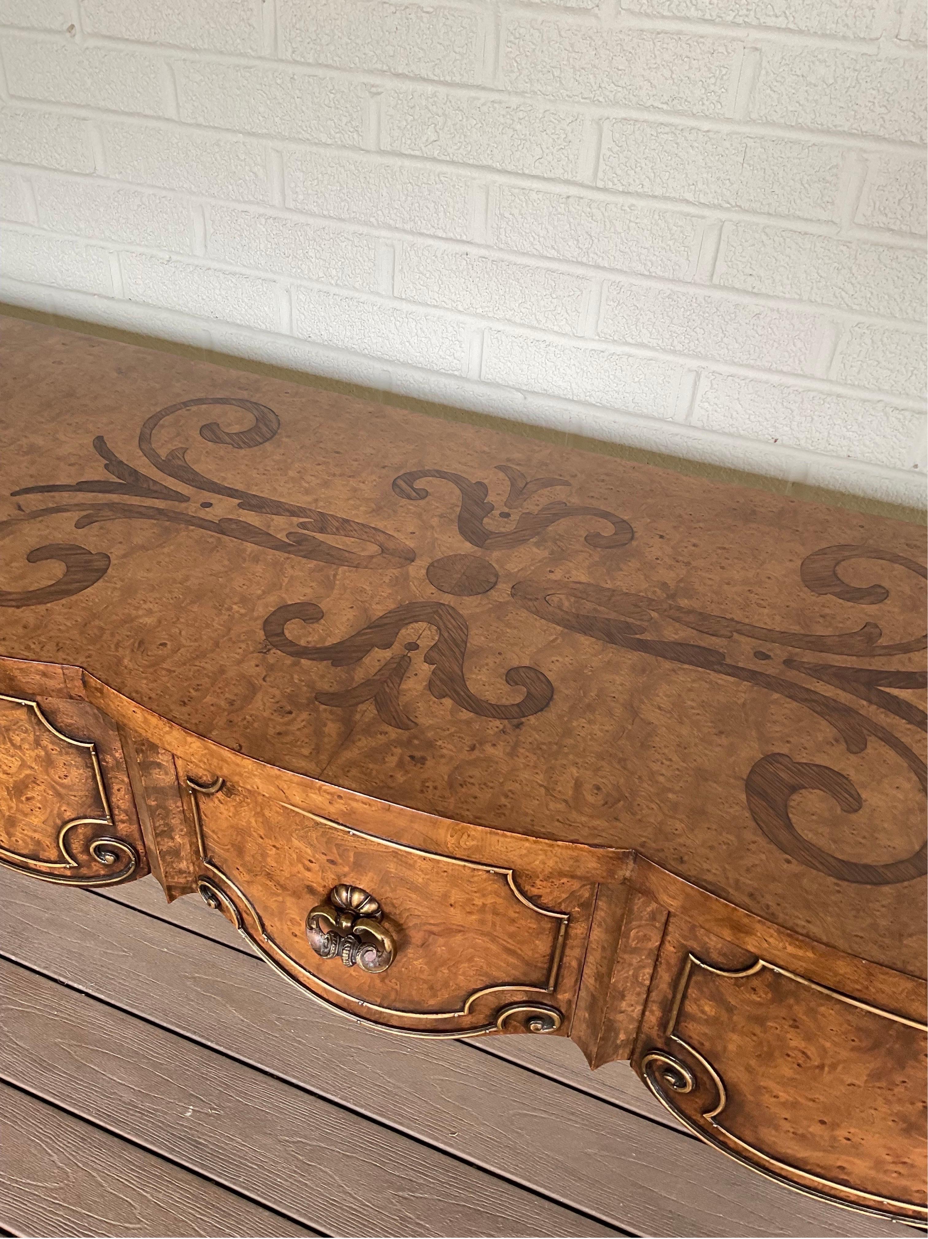 Extremely Rare Mastercraft Console Table. This one owner beauty had an original cost of over $27,000 in the 1970’s. It’s Massive and Magnificent. The marquetry on the top of the console is spectacular and in incredible condition. Don’t miss this