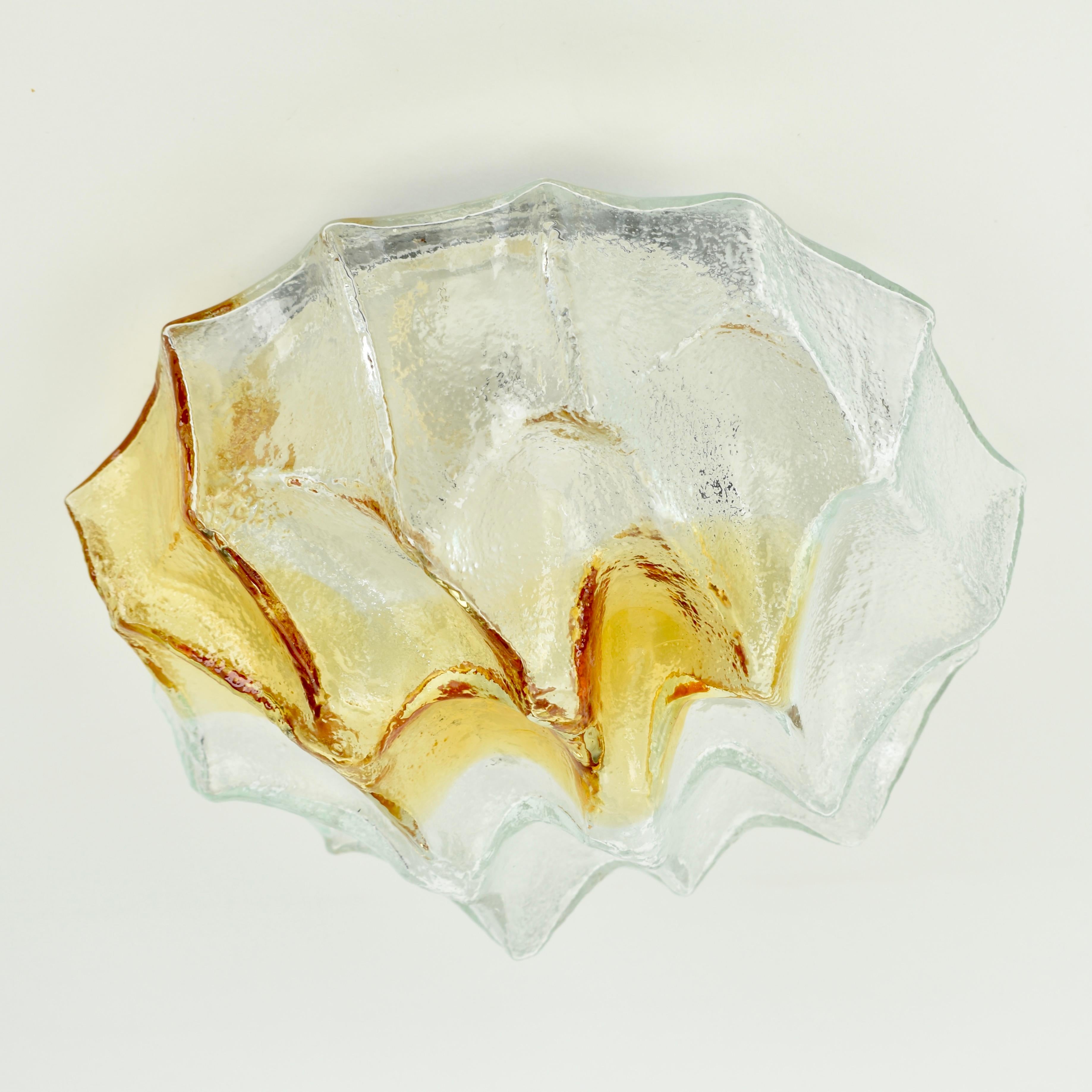 Rare glass flush mount made by AV Mazzega, Murano. The glass is a burnt orange and clear color, the metal base is black metal. In great condition, some minor traces of wear on the base. Glass is in great undamaged condition.

Height: 14 cm /