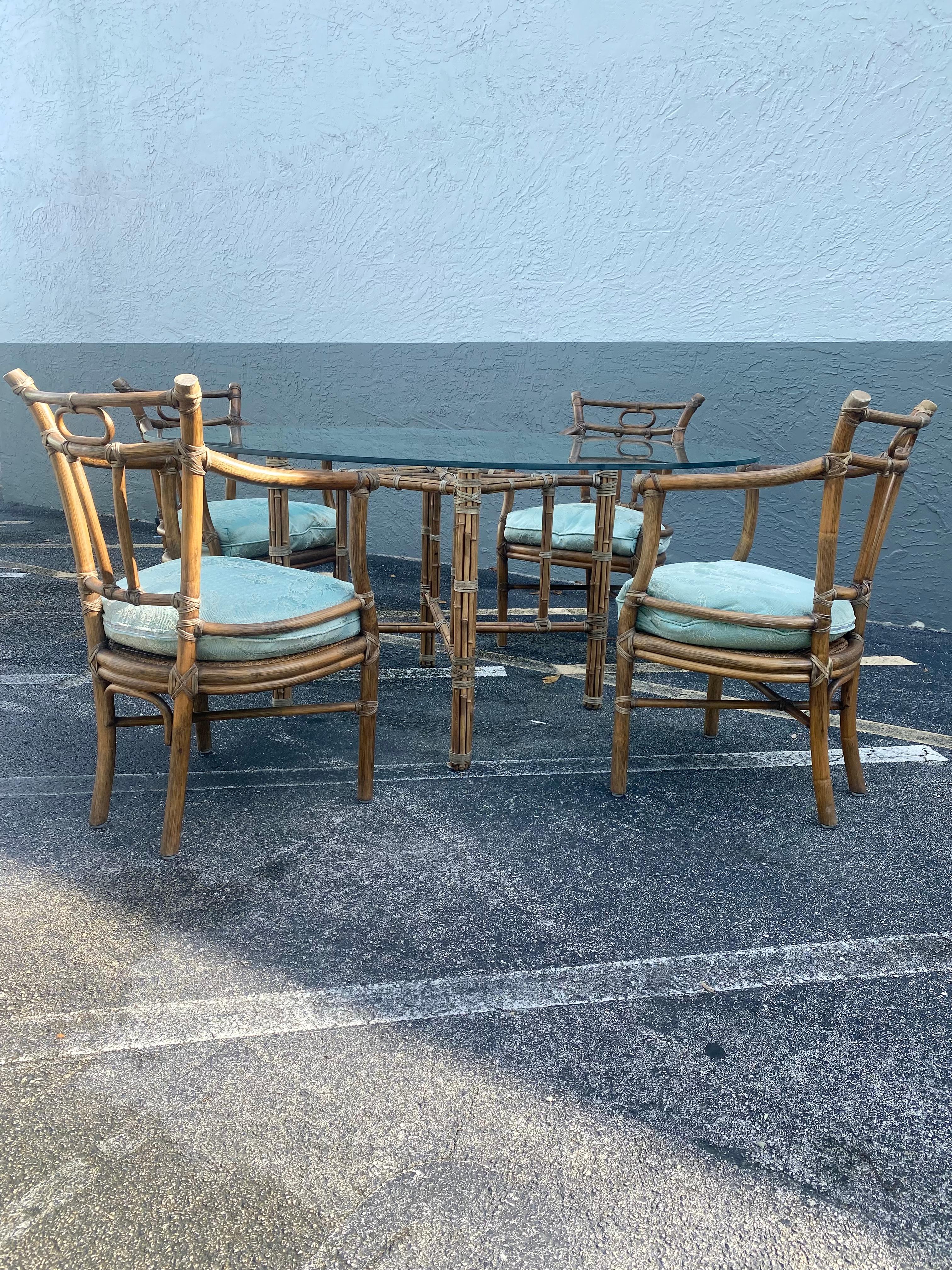 Mid-Century Modern 1970s McGuire Rattan Chinoiserie Down Round Glass Dining Set, Set of 5 For Sale