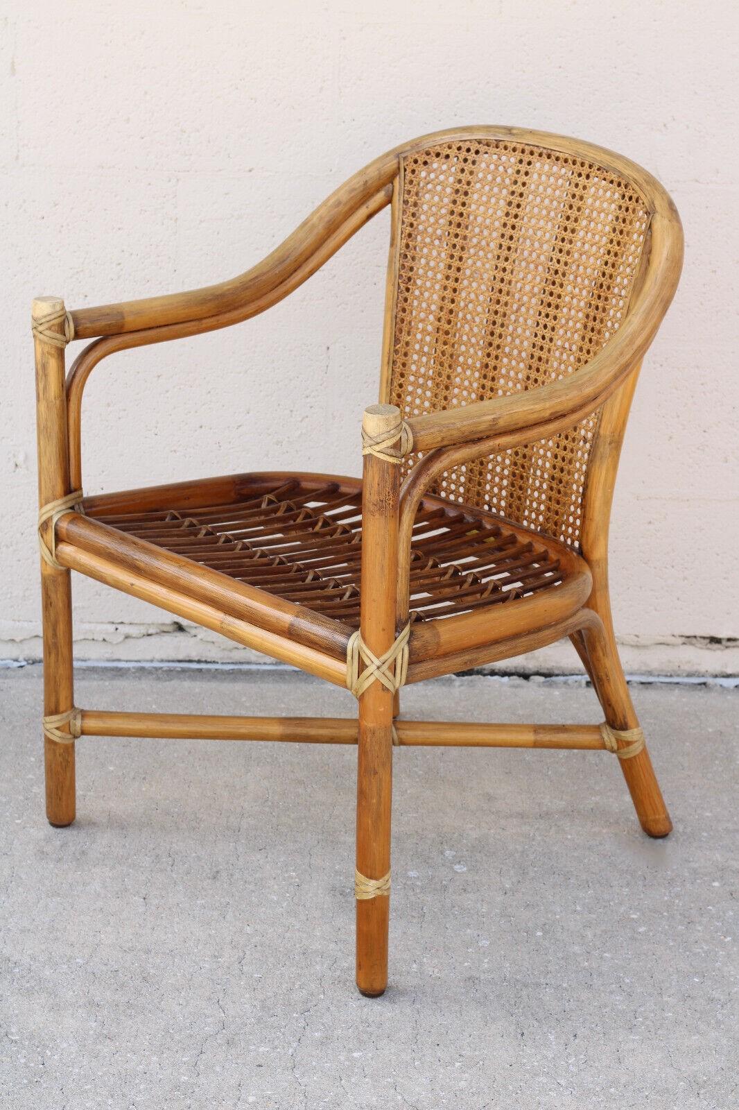 Hand-Crafted 1970s McGuire San Francisco Rattan Cane Back Dining Arm Chairs, a Pair For Sale