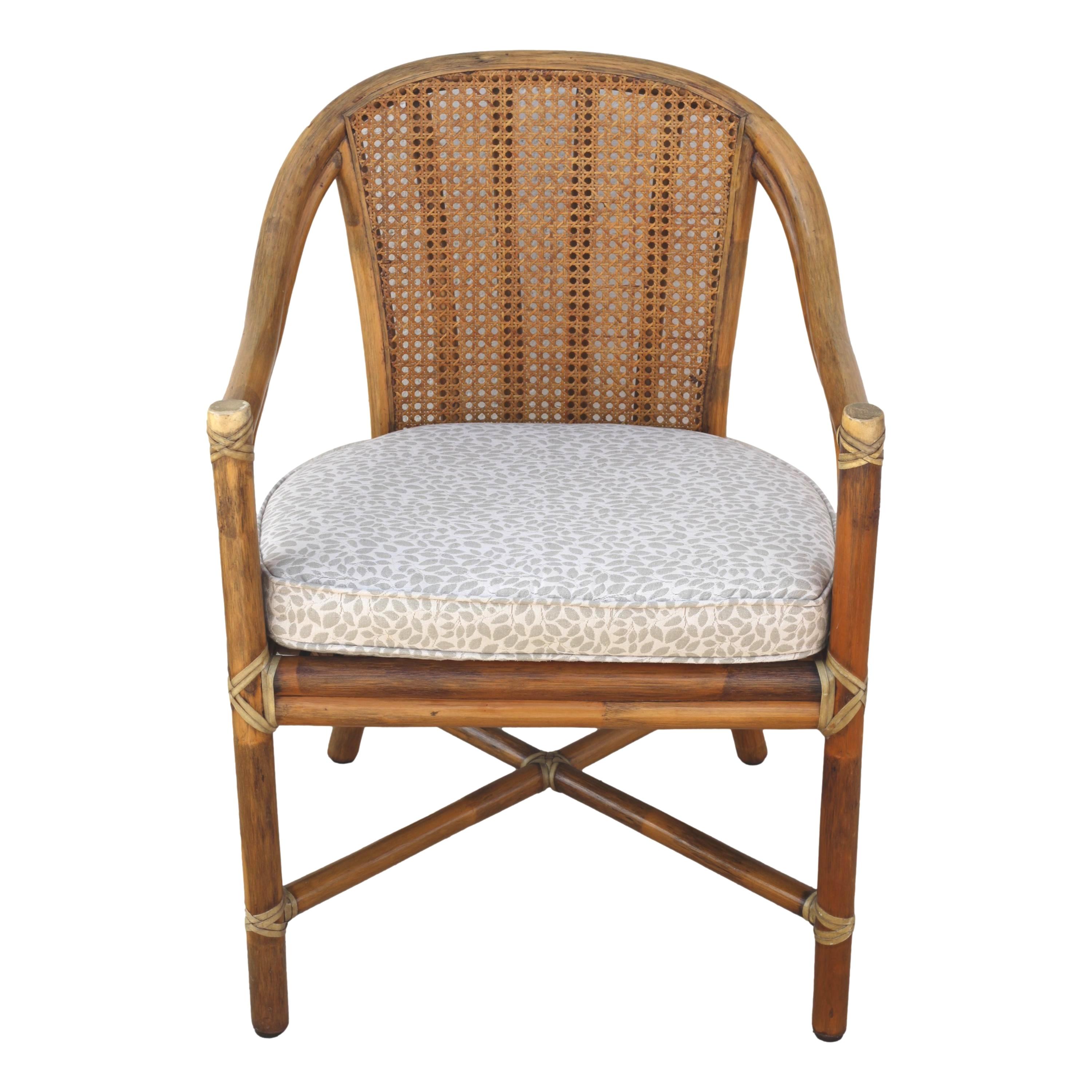 American 1970s McGuire San Francisco Rattan Cane Back Dining Arm Chairs, a Pair For Sale