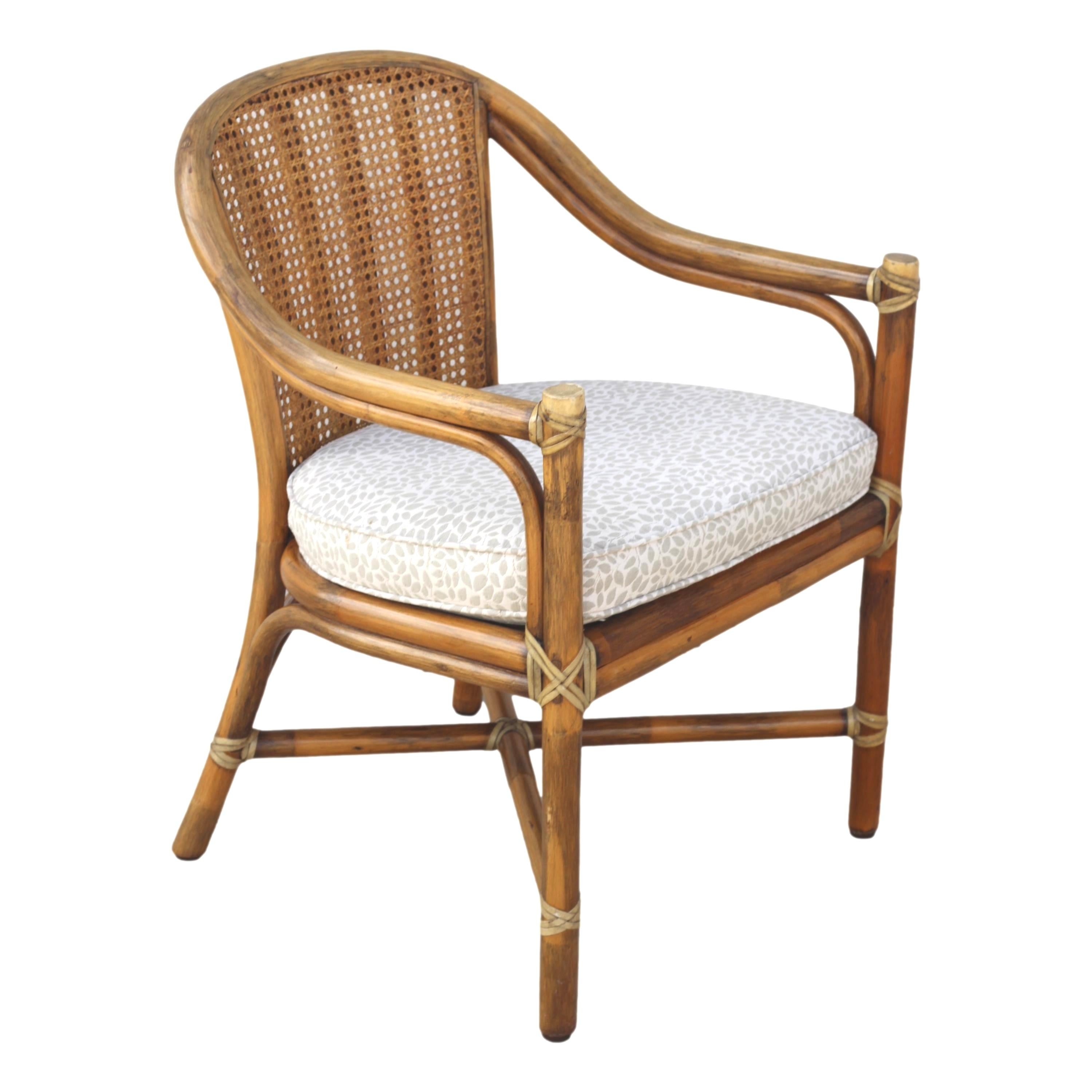 Organic Modern 1970s McGuire San Francisco Rattan Cane Back Dining Arm Chairs, a Pair For Sale