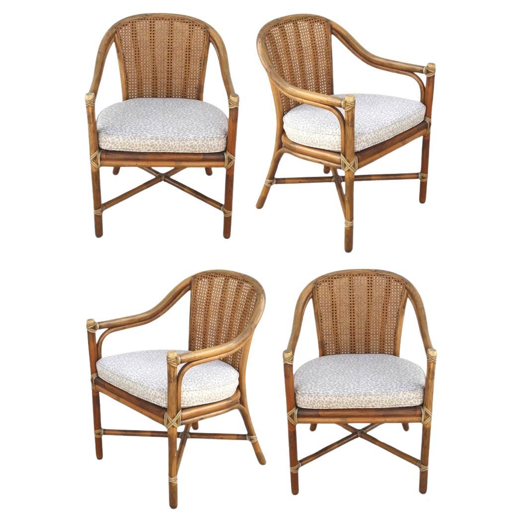 1970s McGuire San Francisco Rattan Cane Back Dining Arm Chairs, a Set of Four