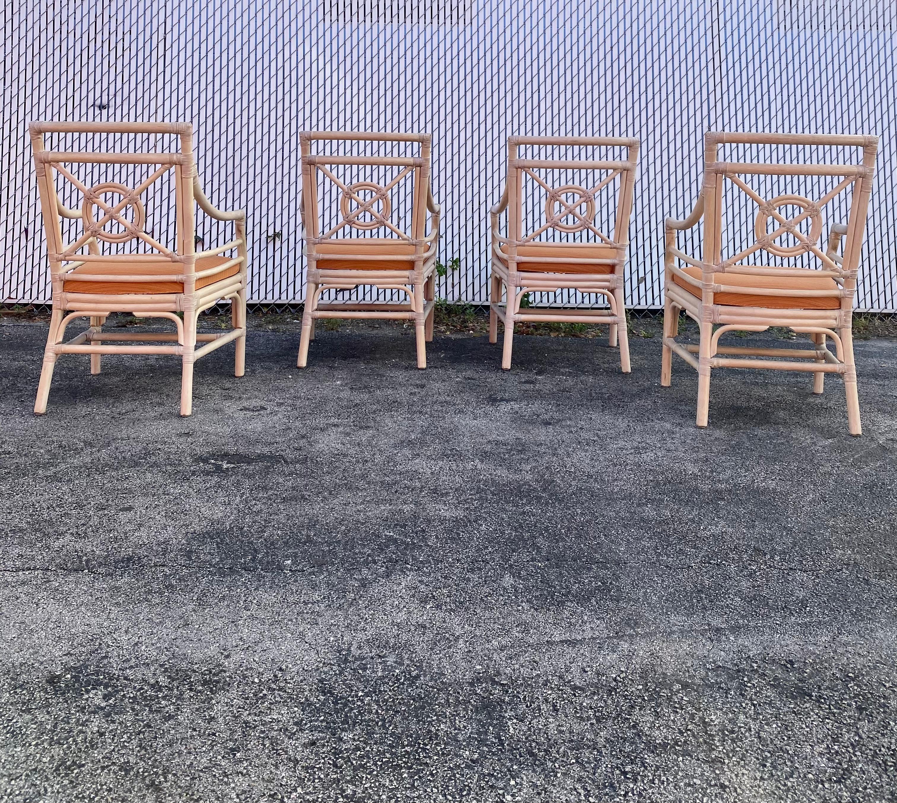 1970s, McGuire Target Style Rattan Dining Side Armchairs, Set of 4 In Good Condition For Sale In Fort Lauderdale, FL