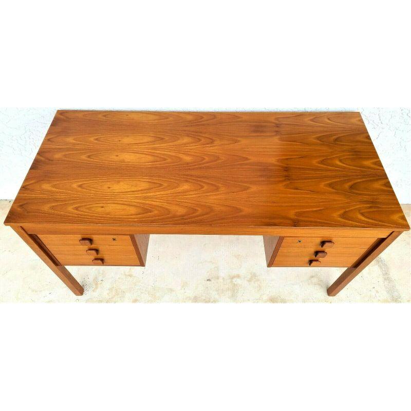 Offering One Of Our Recent Palm Beach Estate Fine Furniture Acquisitions Of A
1970's Domino Mobler MCM Danish Modern Teak Desk 6 Drawer from Denmark

With locks on both sides but there are no keys.

Approximate Measurements in Inches
28.75