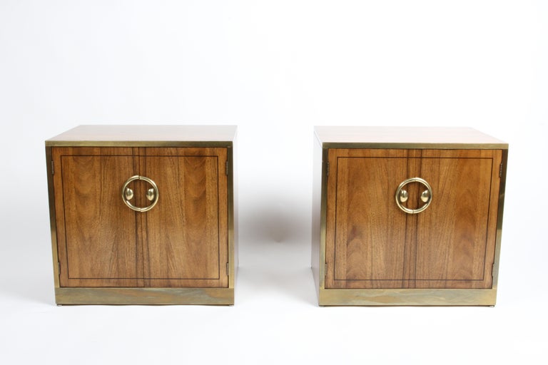 Fantastic pair of restored Mid-Century Modern Mastercraft nightstands or end tables in bleached Rosewood with brass handles and trim. The exterior cabinets, have been refinished, the insides are very nice, patina to brass trim. The interior of the