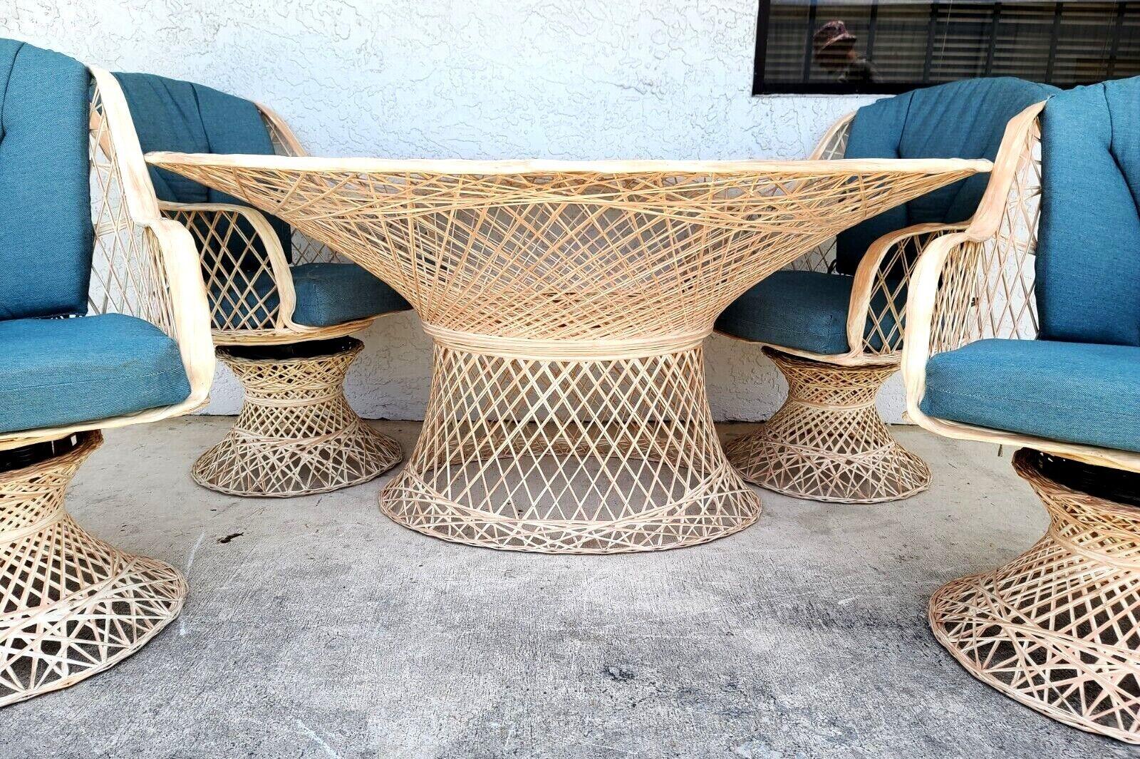 For FULL item description click on CONTINUE READING at the bottom of this page.

Offering One Of Our Recent Palm Beach Estate Fine Furniture Acquisitions Of A

1970s MCM RUSSELL WOODARD Style Spun Fiberglass Outdoor Dining Set
Set includes 4 swivel